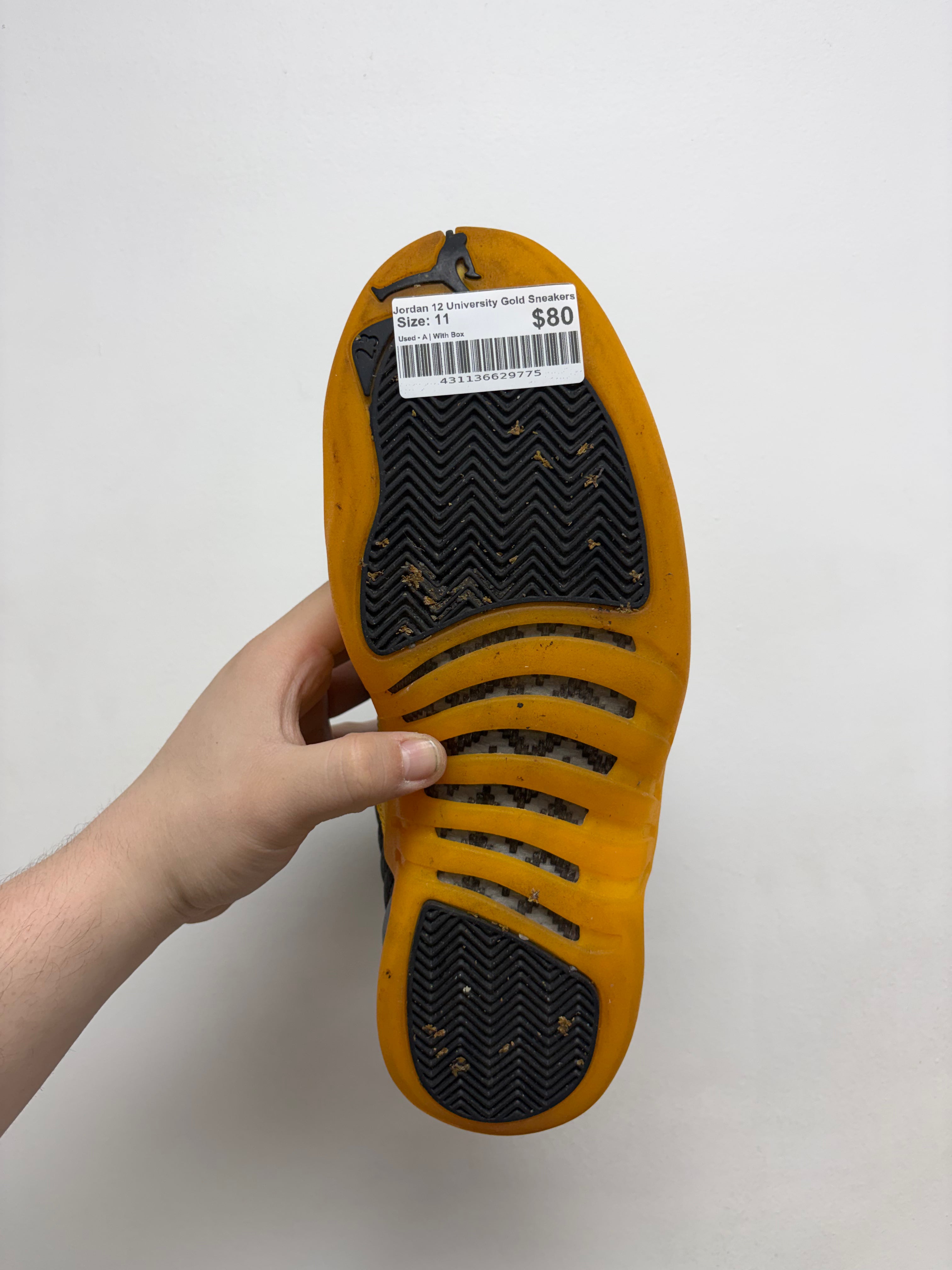 Jordan 12 University Gold Sneakers