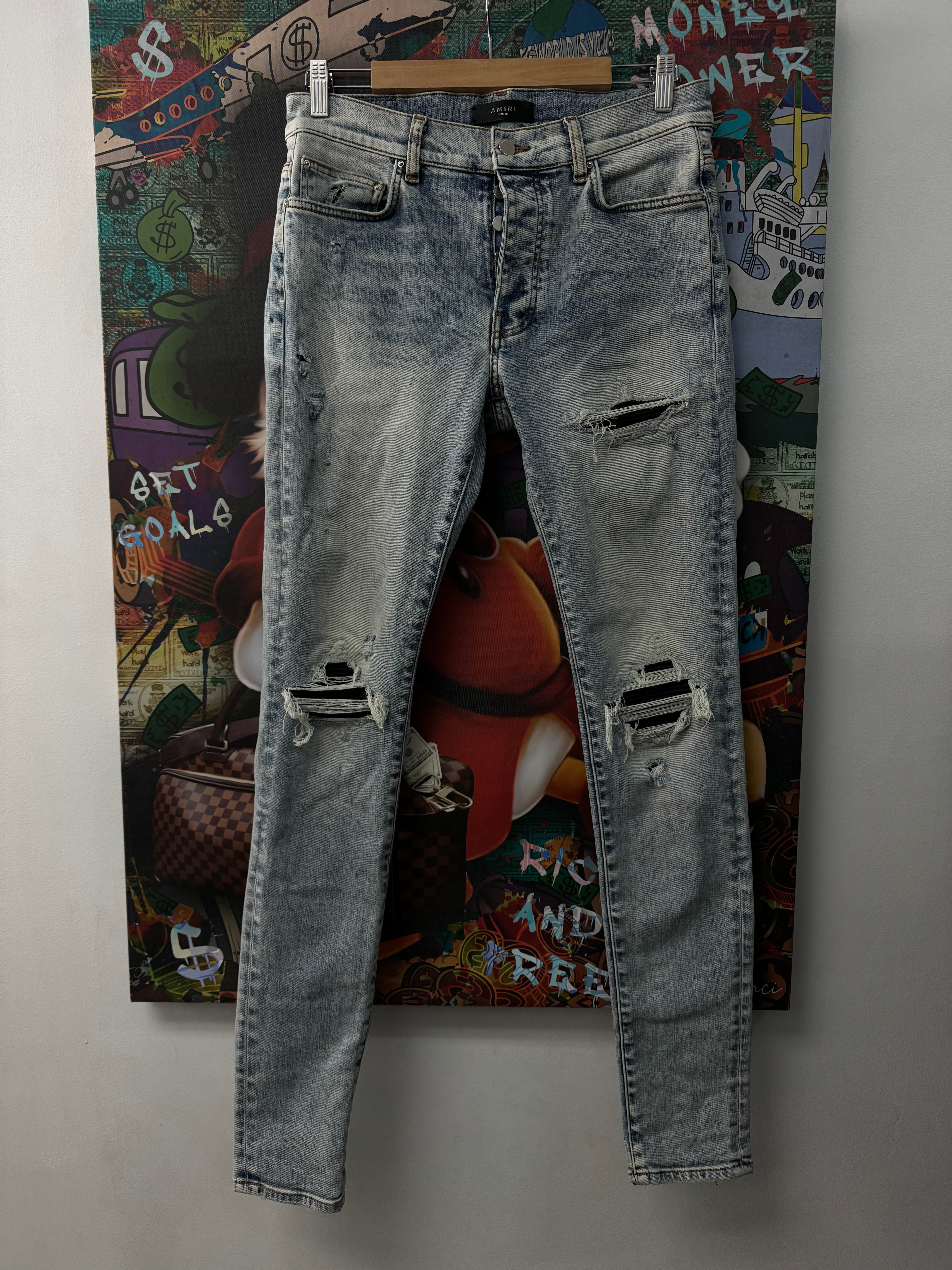 Amiri Mx1 Light Wash Black Patch Jeans
