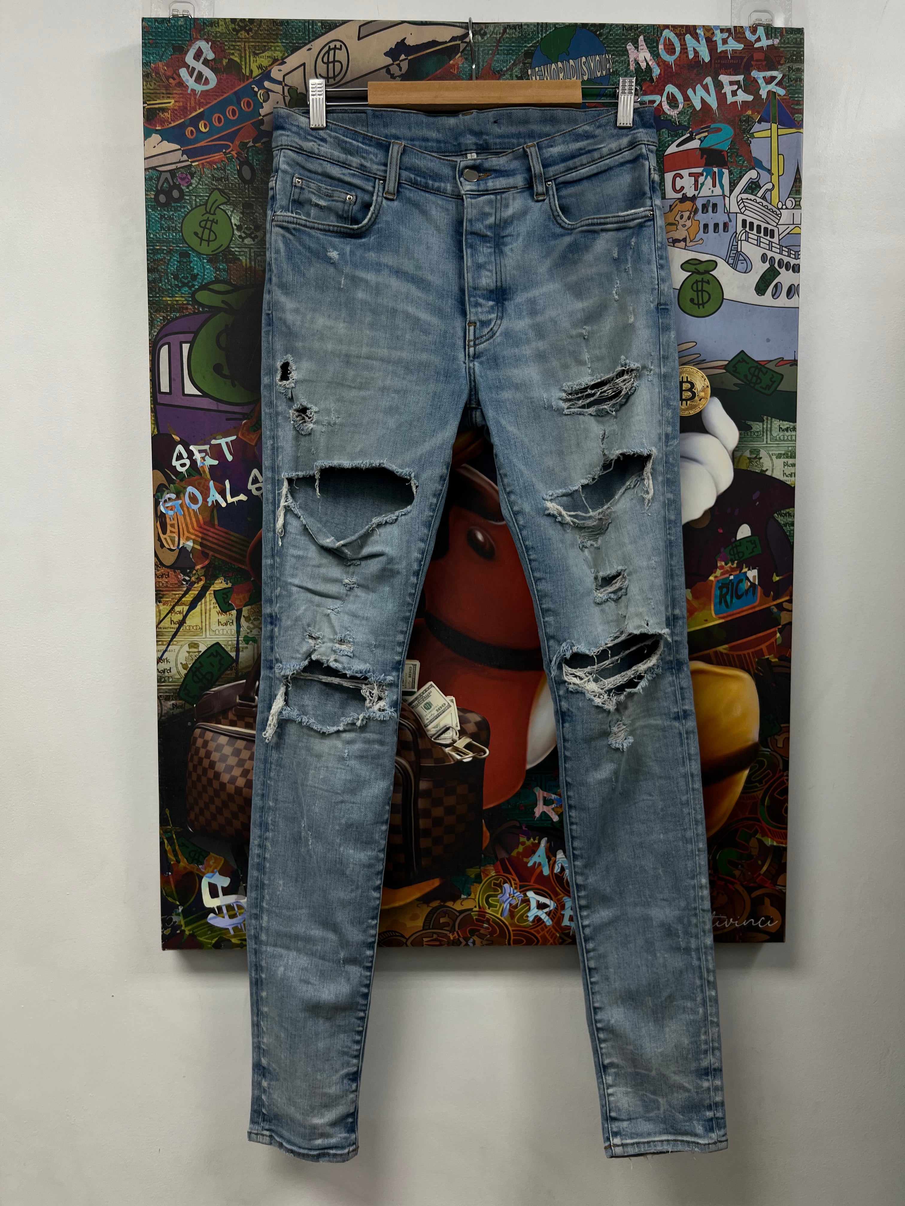 Amiri Light Wash Plain Ripped Jeans