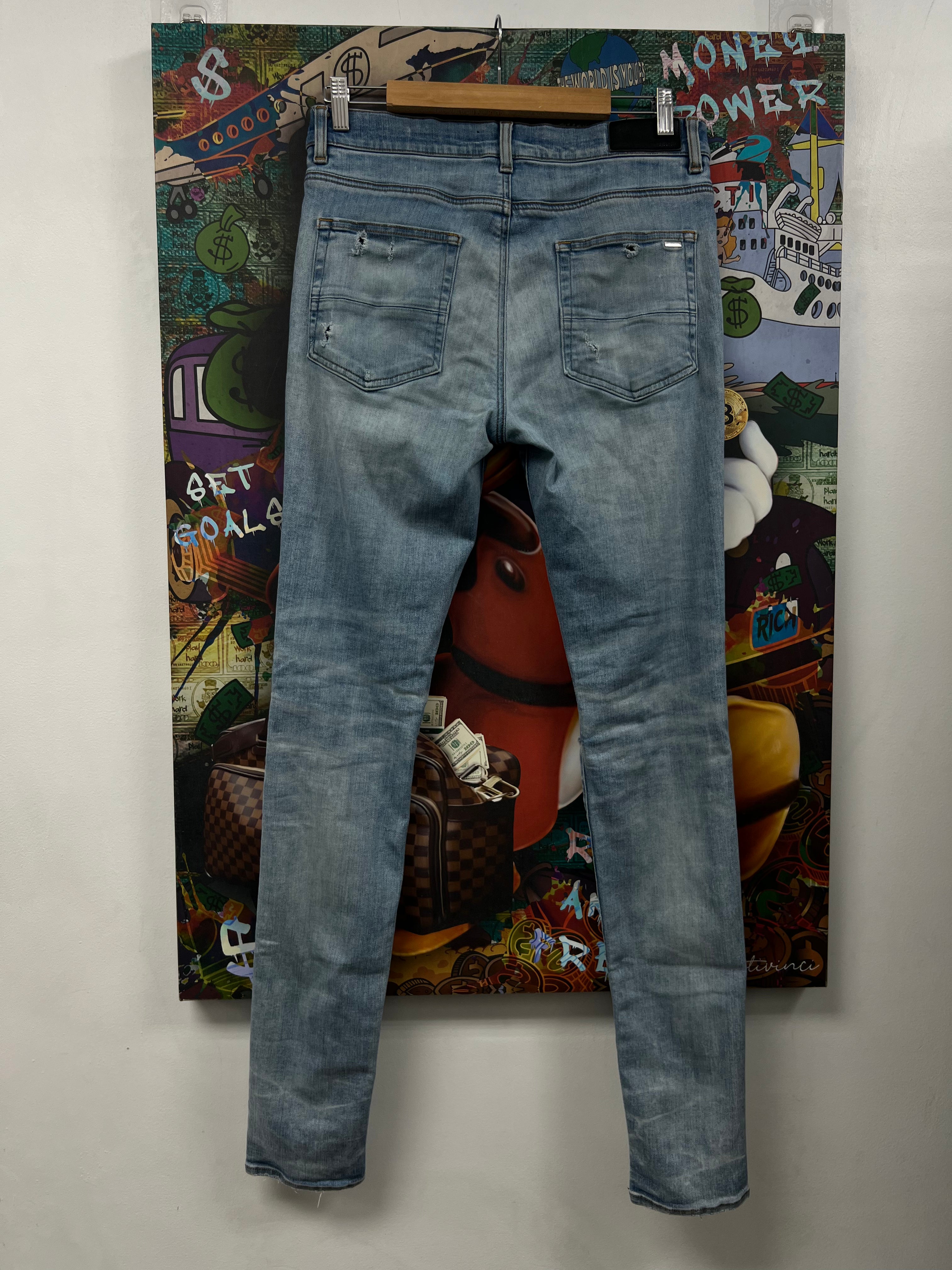 Amiri Light Wash Plain Ripped Jeans
