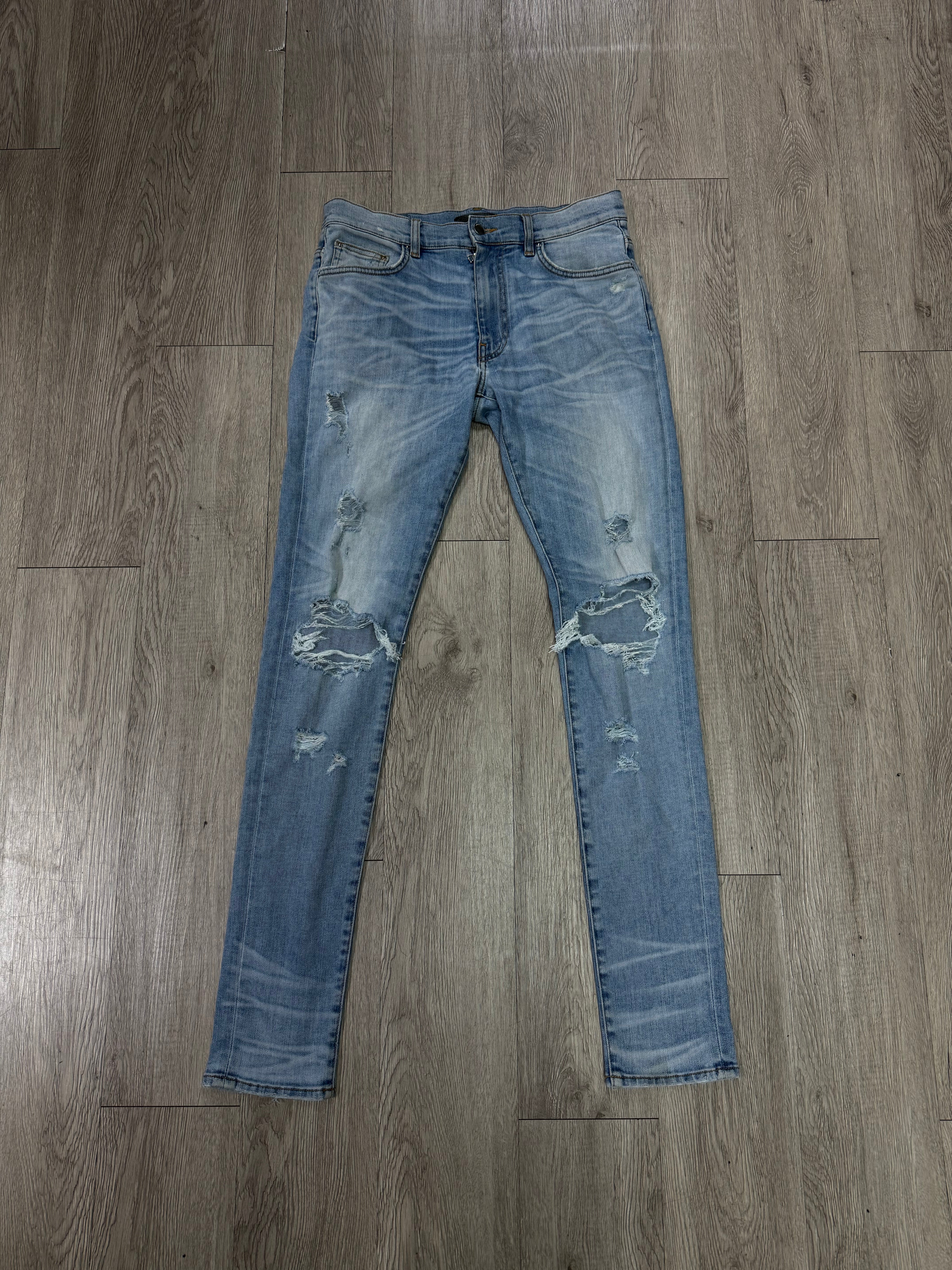 Amiri Light Wash Knee Rip (Zipper) Jeans
