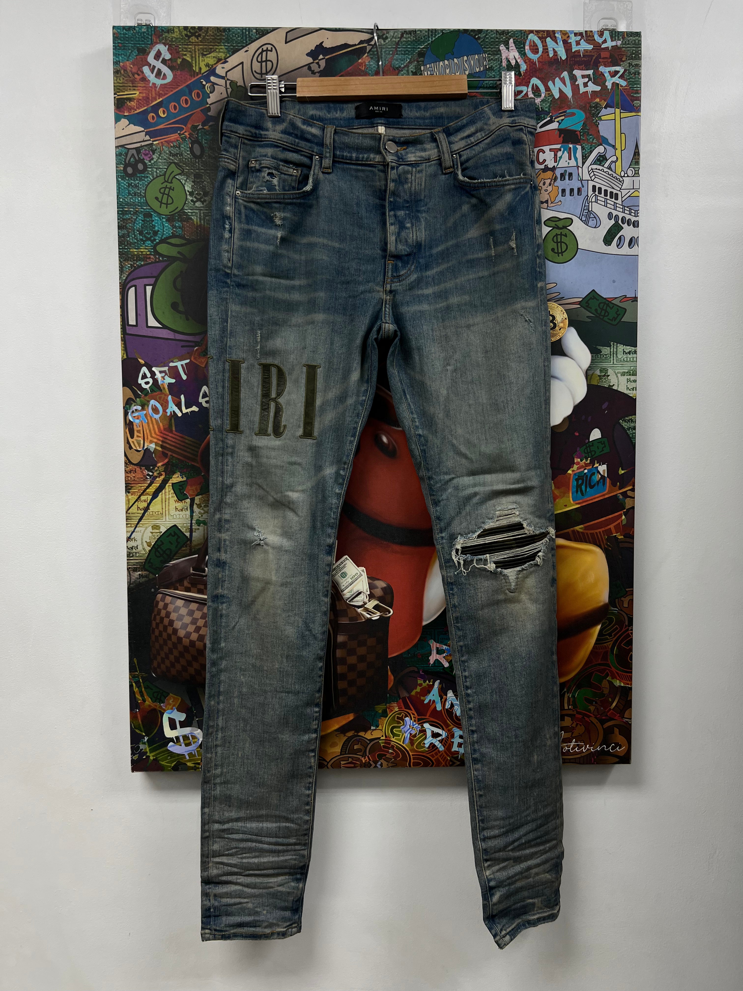 Amiri Light Wash Camo Side Logo Jeans