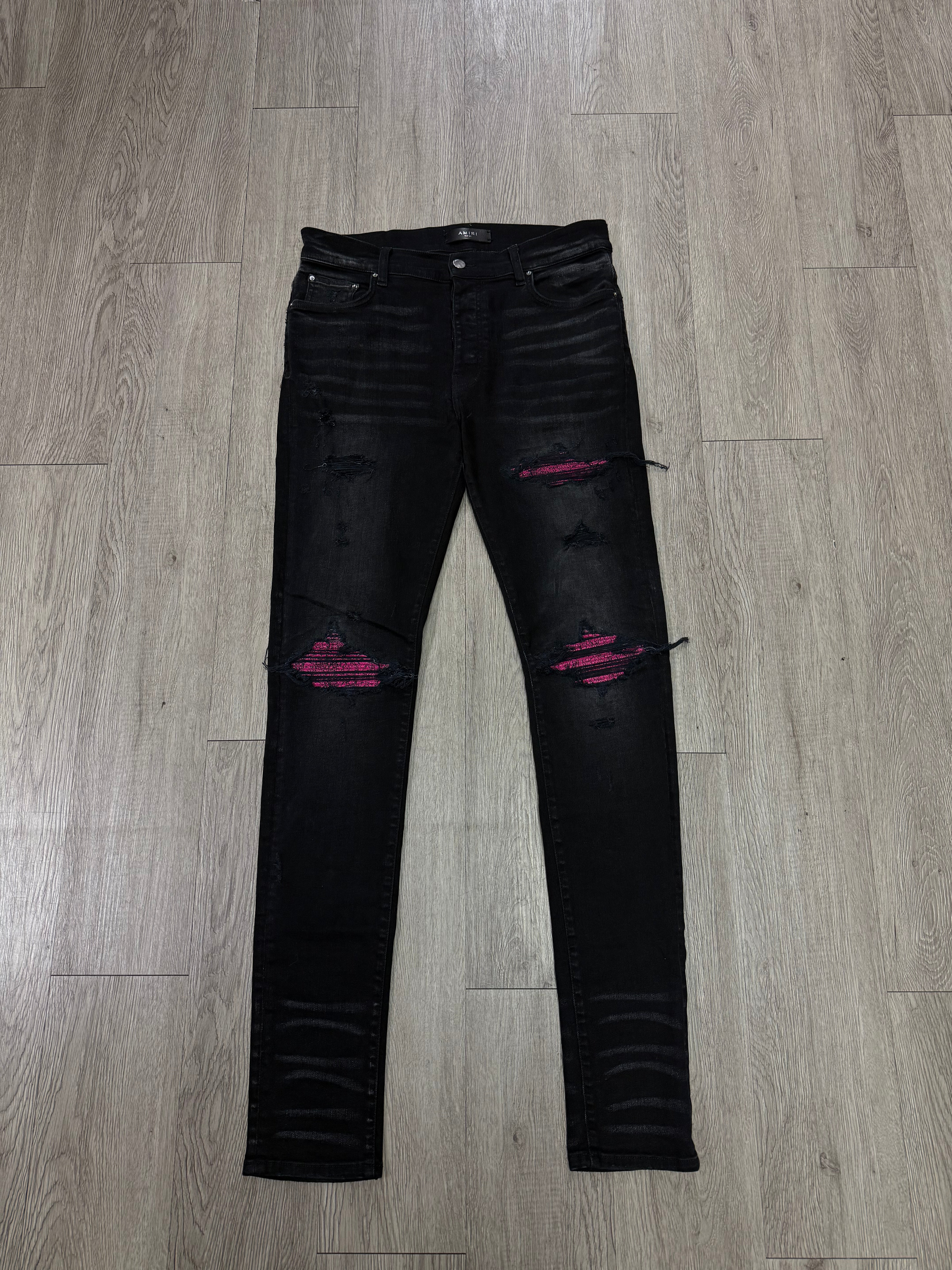 Amiri MX1 Black Wash Pink Crackle Patch Jeans