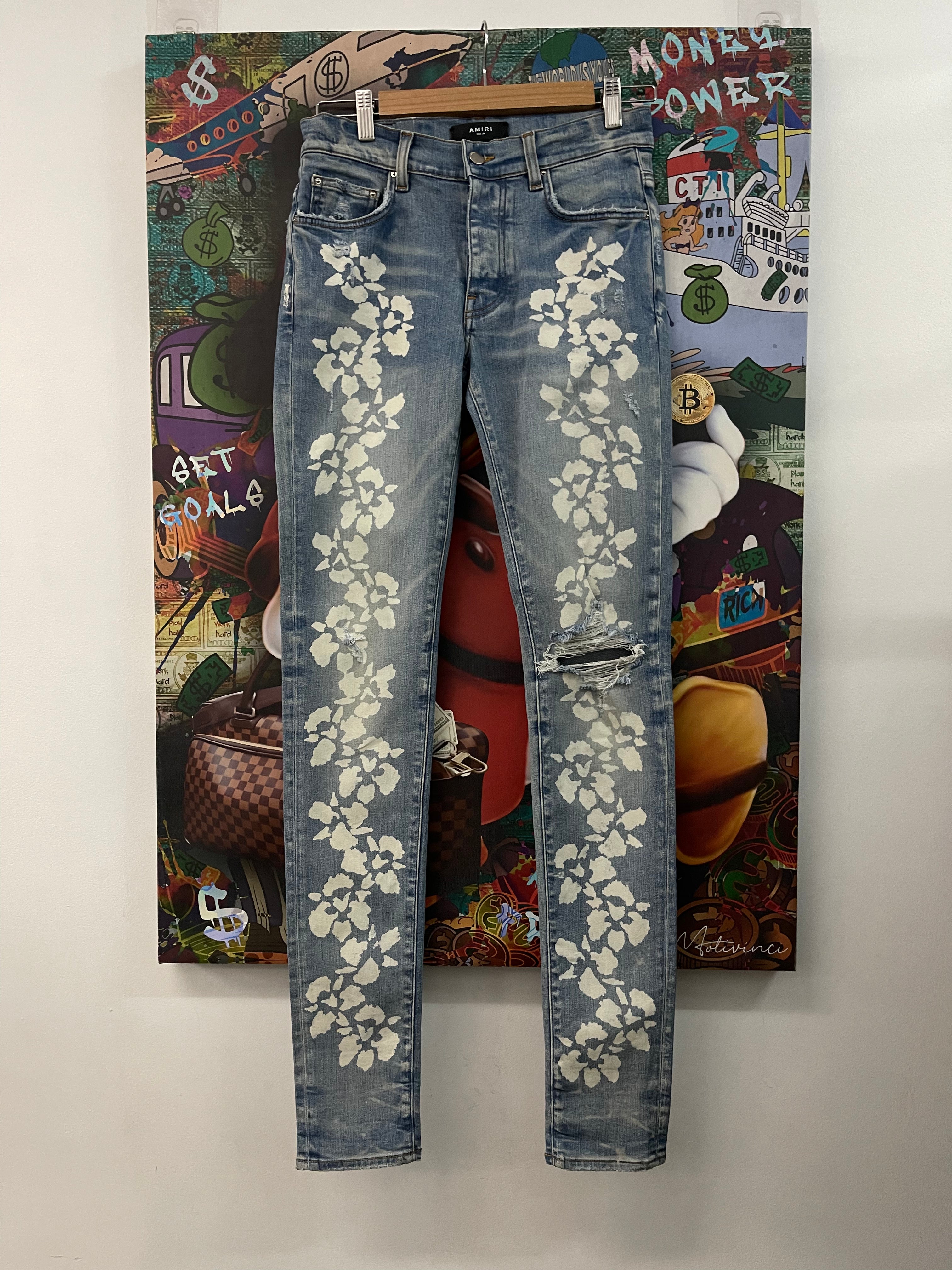 Amiri Light Wash White Floral Thrasher Jeans