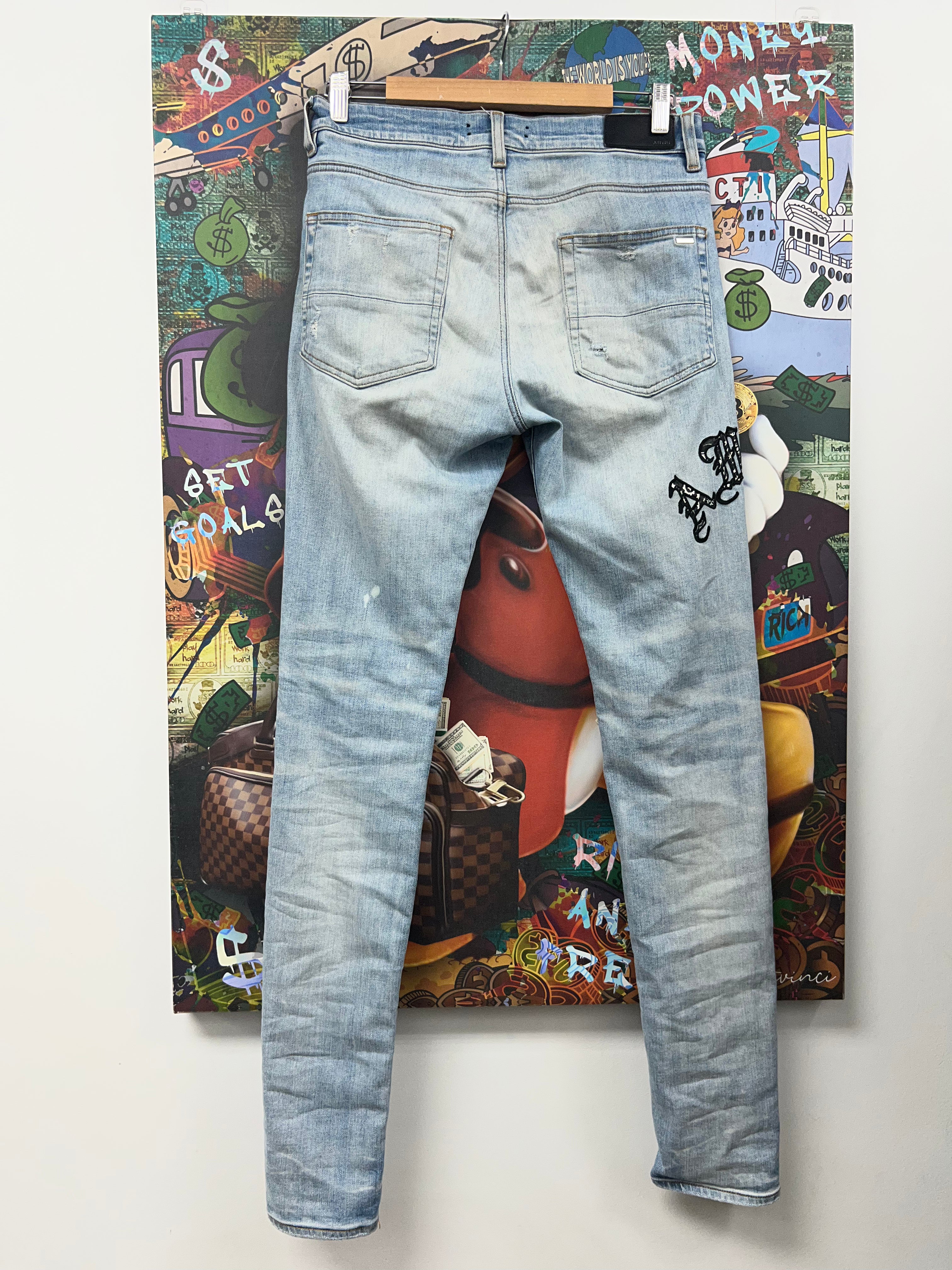 Amiri Light Wash Paisley Old English Jeans