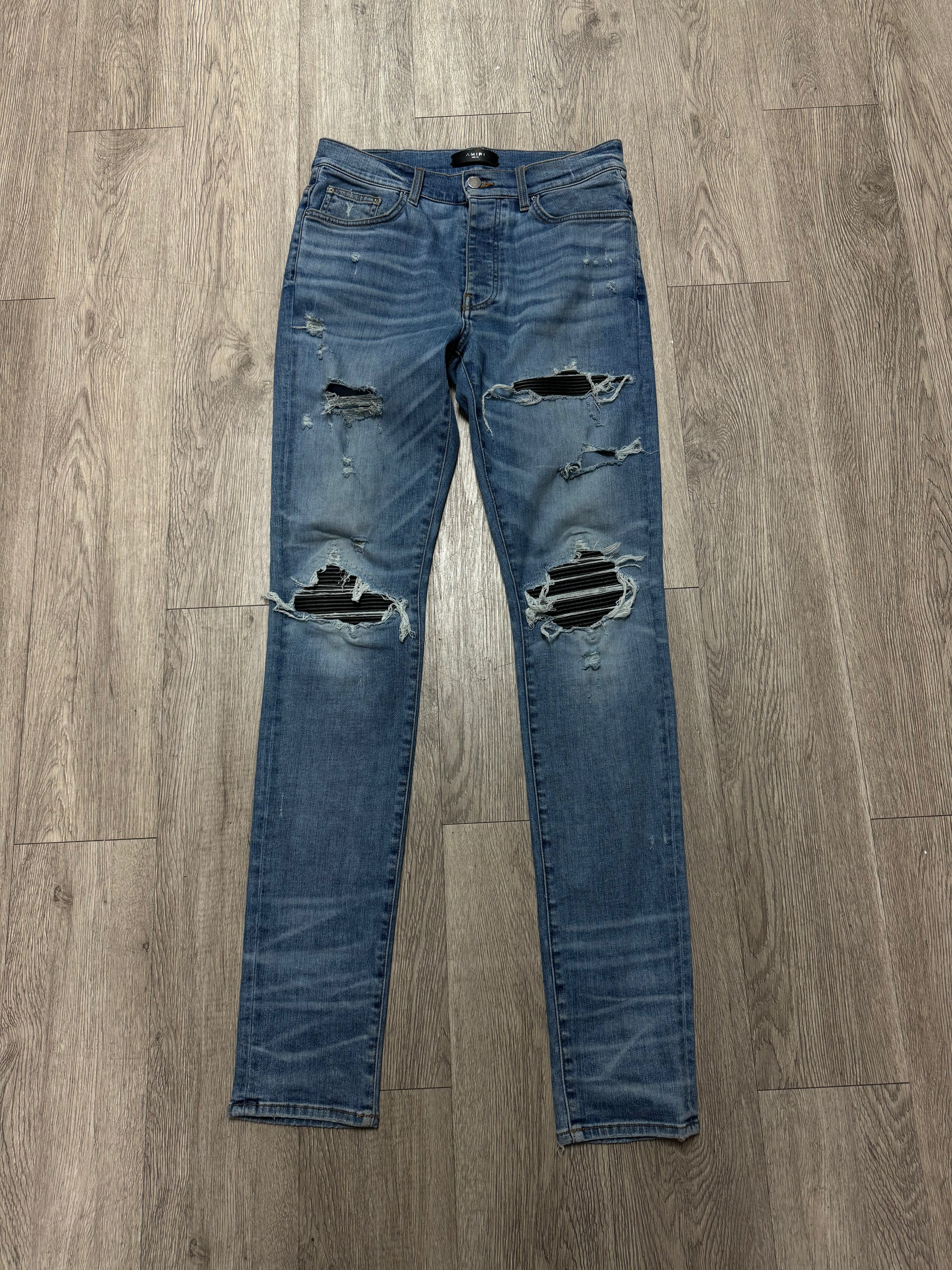 Amiri MX1 Light Wash Black Jeans