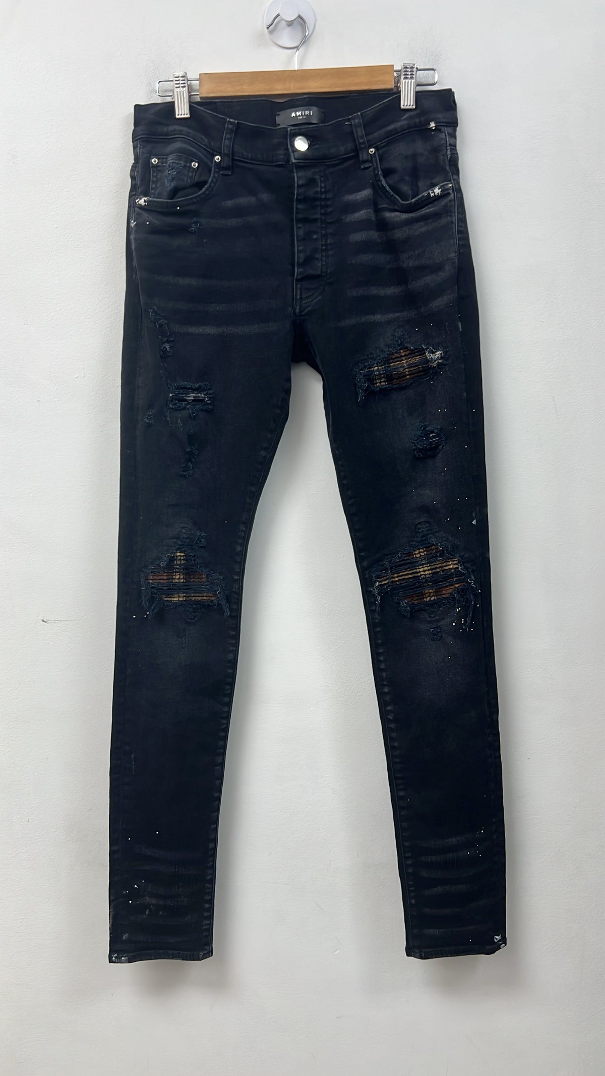 Amiri MX1 Black Wash Brown Plaid Patch Jeans