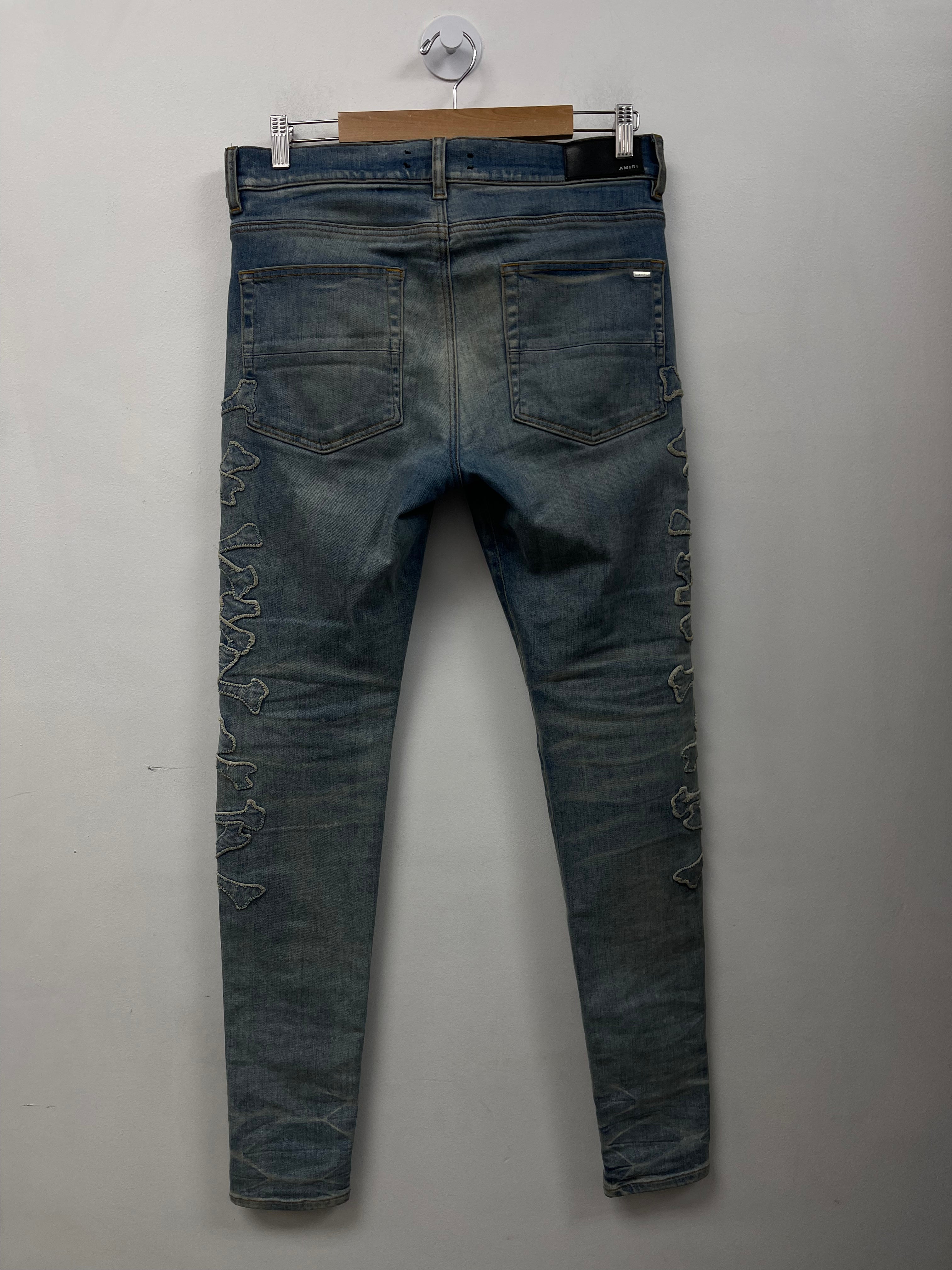 Amiri Light Wash Denim Bones Jeans