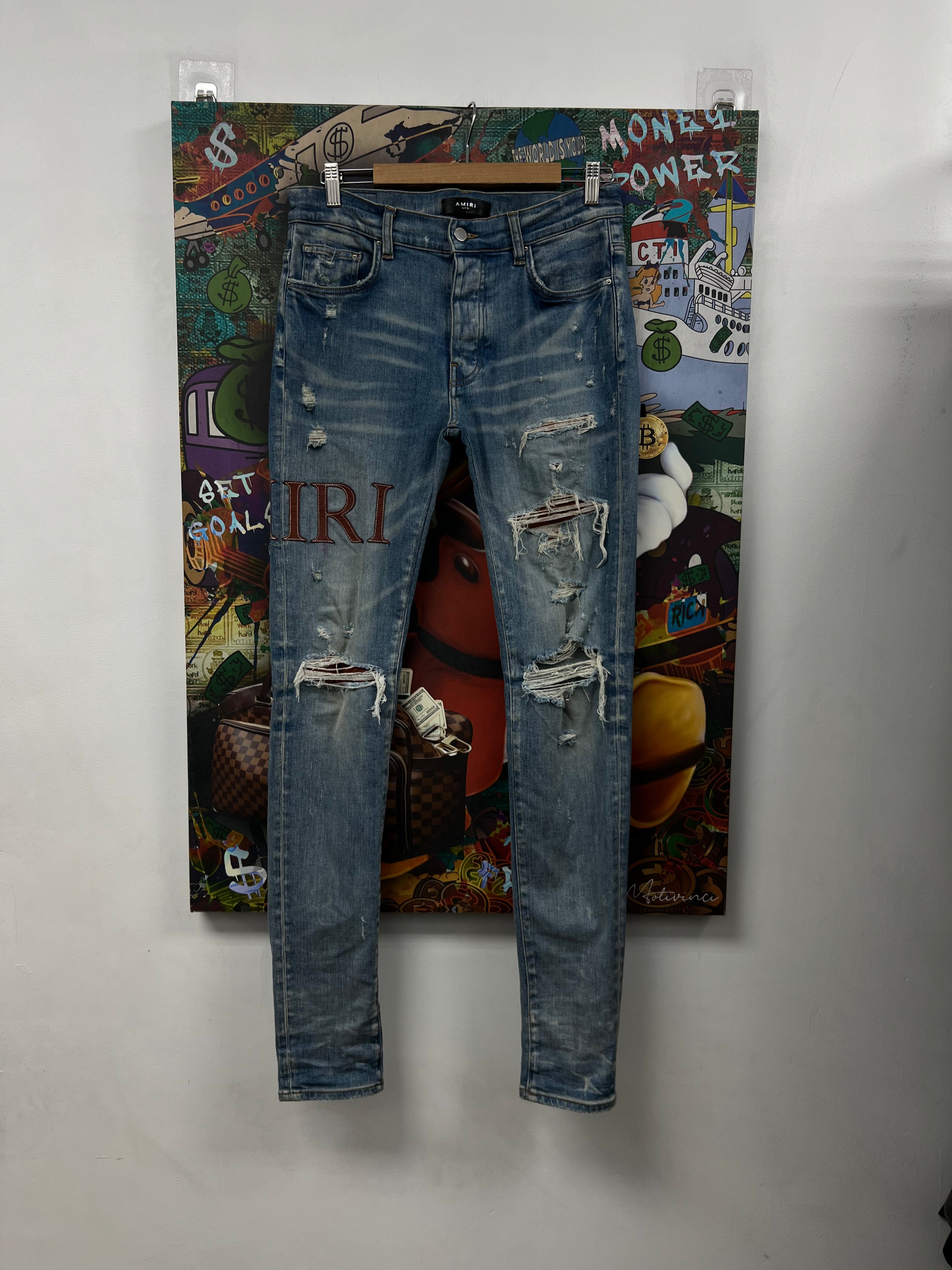 Amiri Light Wash Clay Side Logo Jeans