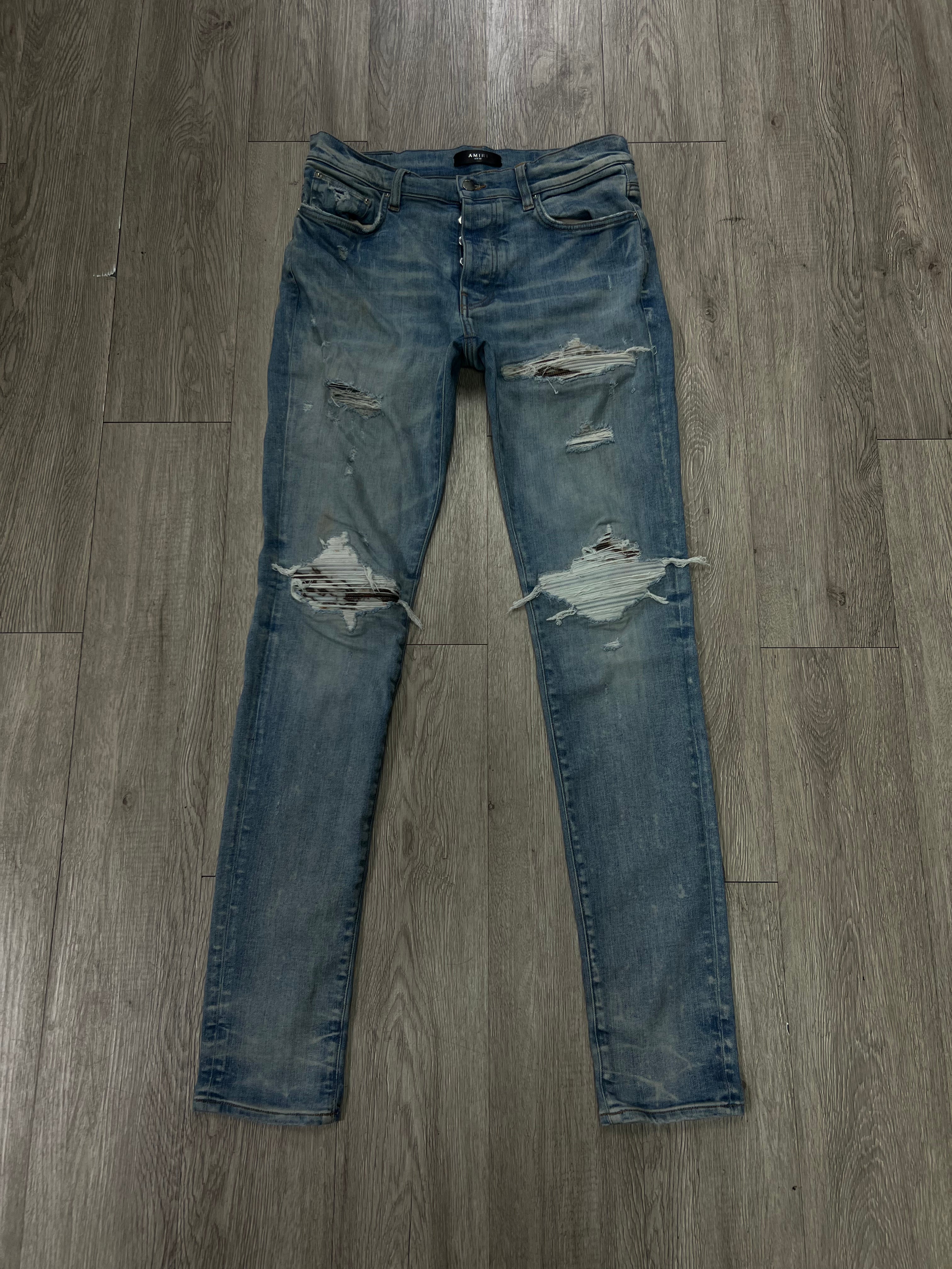 Amiri MX1 Light Wash Marble Suede Patch Jeans