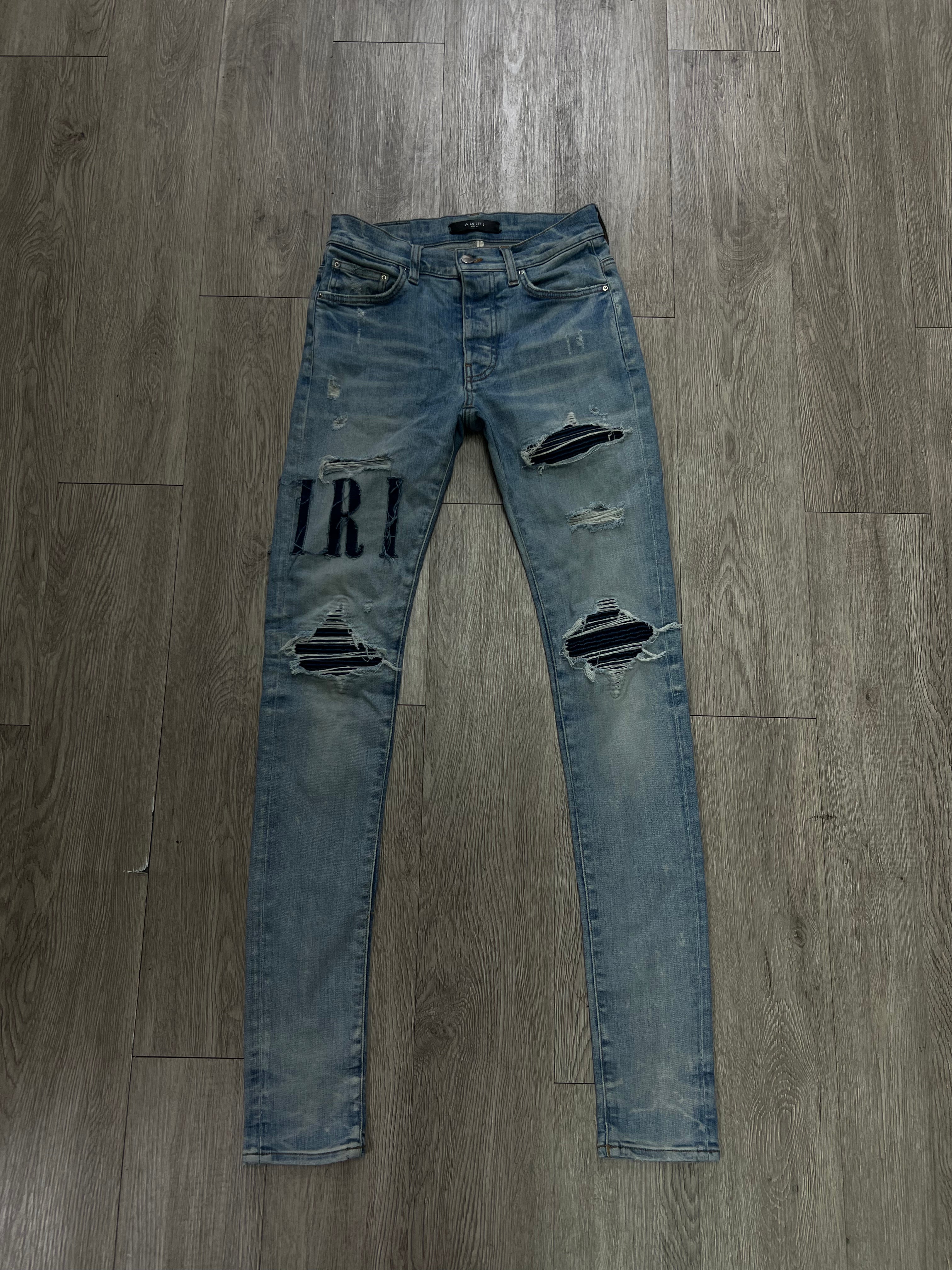 Amiri MX1 Light Wash Denim Applique Side Logo Jeans