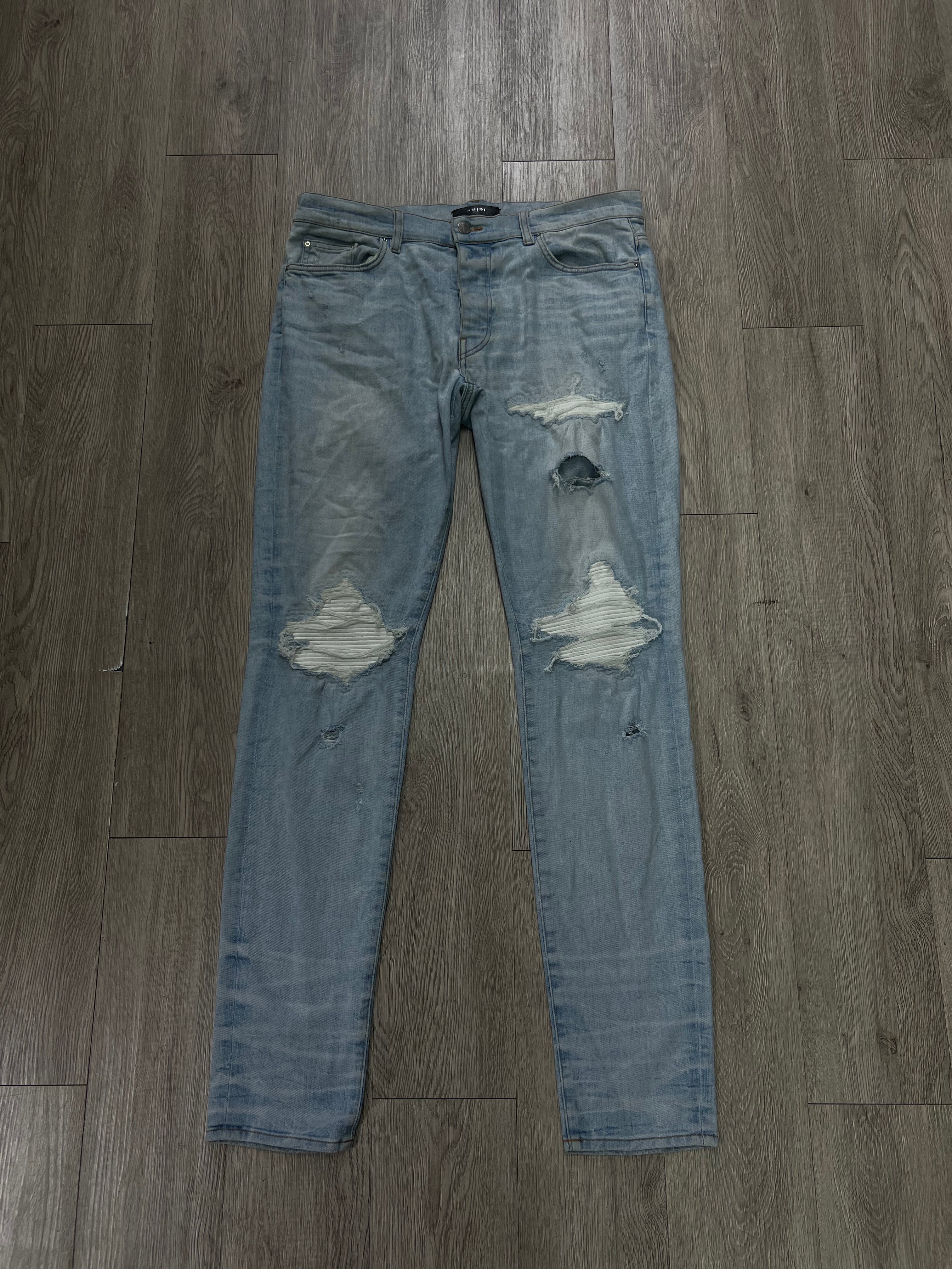 Amiri MX1 Light Wash White Leather Patch Jeans