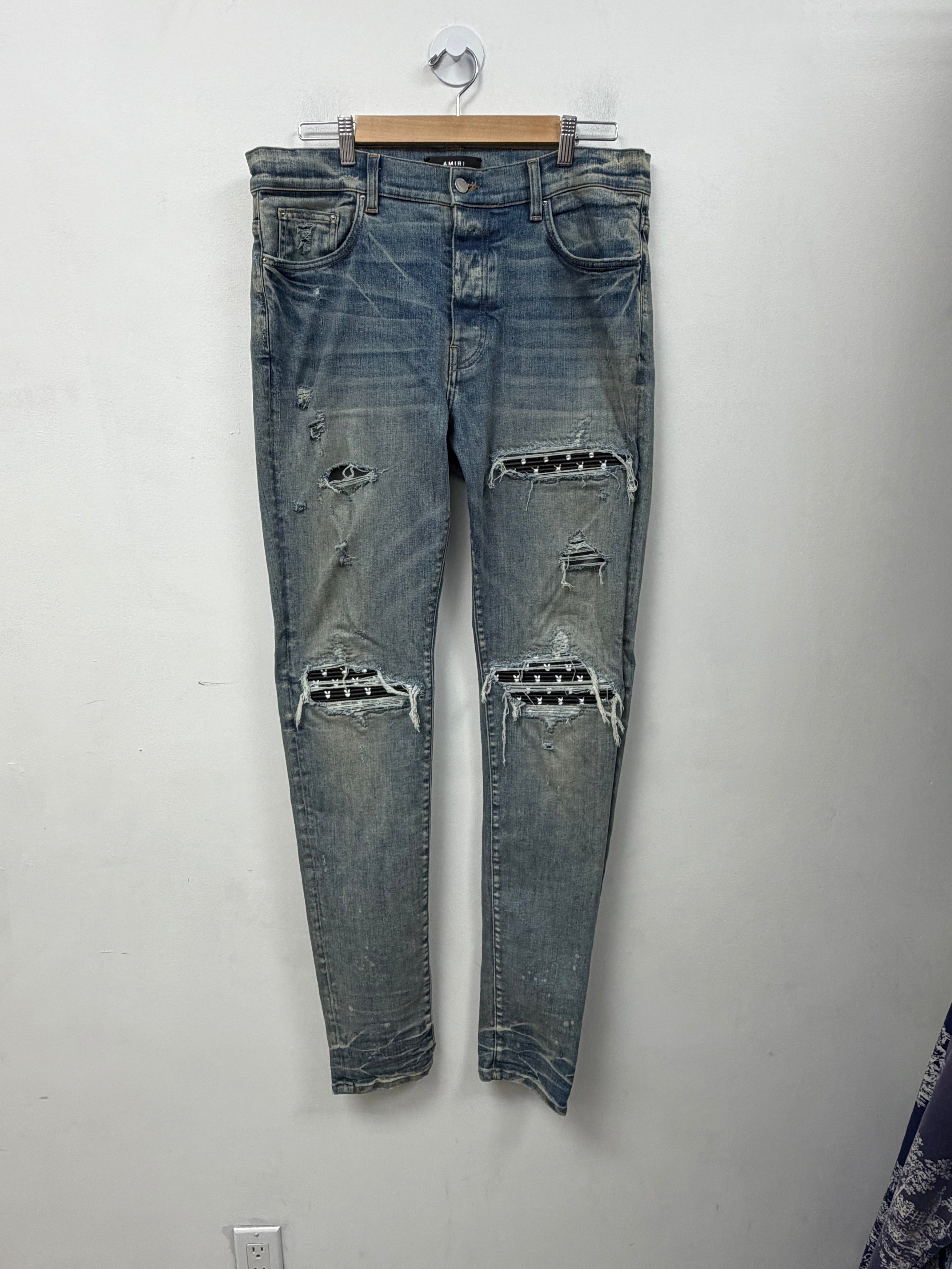 Amiri MX1 Light Wash Playboy Patch Jeans