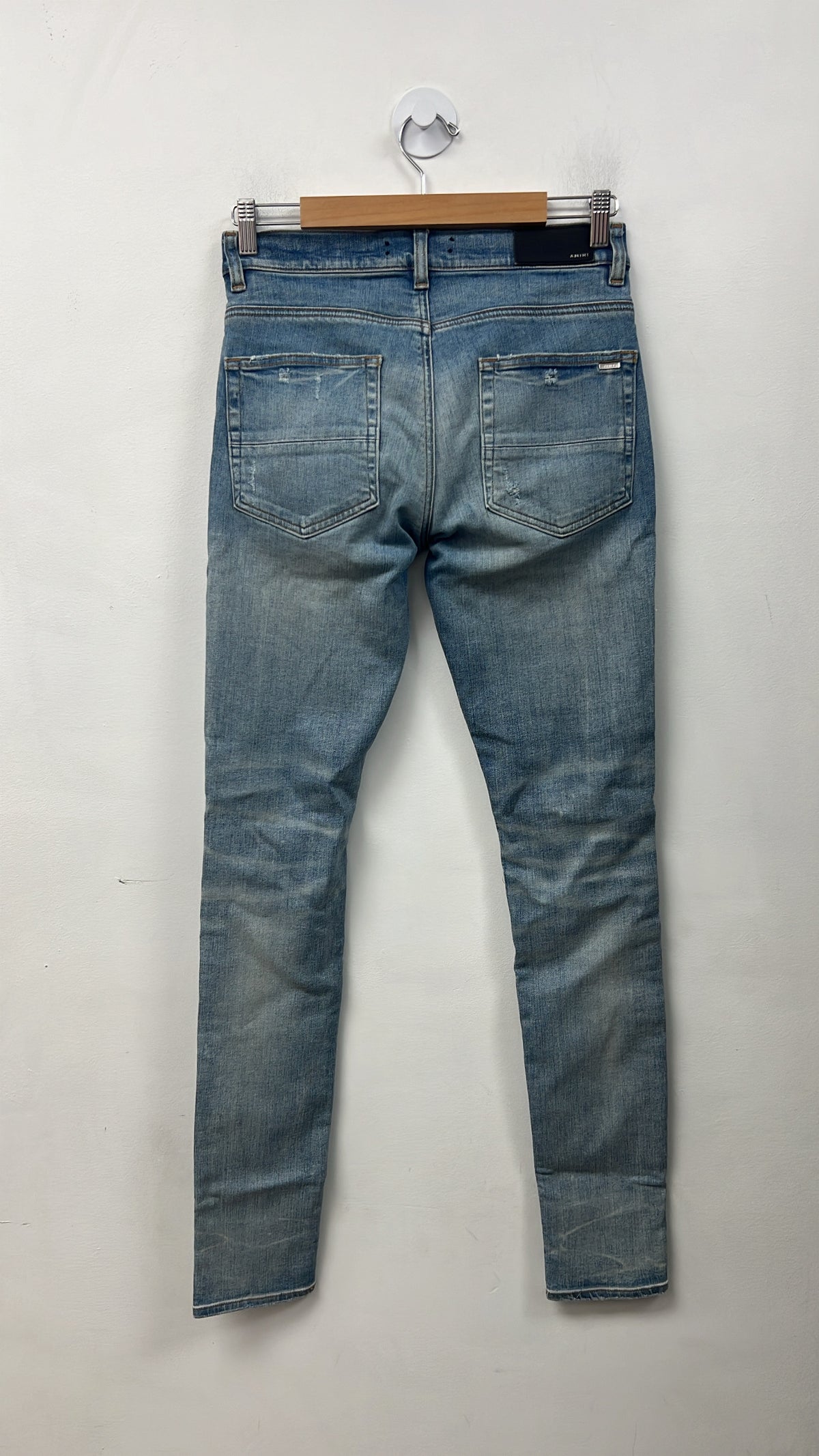 Amiri Light Wash Rainbow Thrasher Patch Jeans