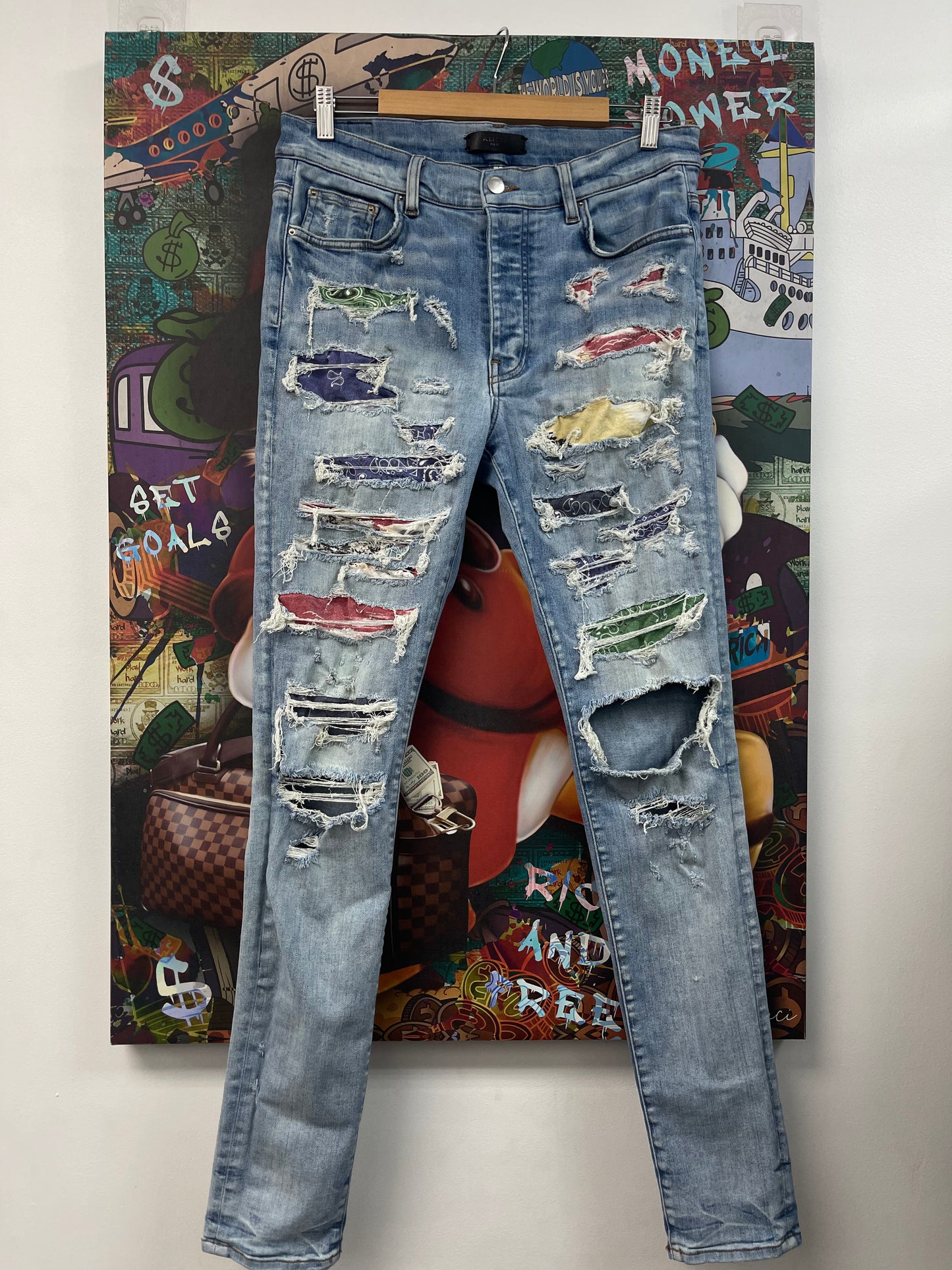 Amiri Multi Color Light Wash Thrasher Jeans
