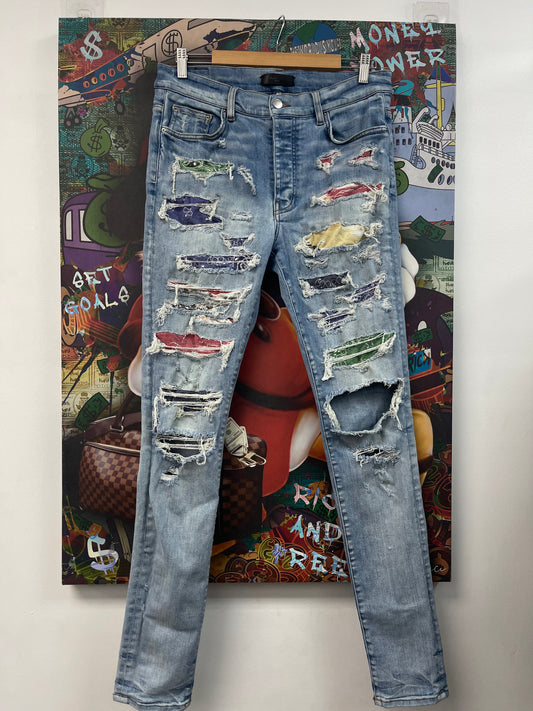 Amiri Multi Color Light Wash Thrasher Jeans