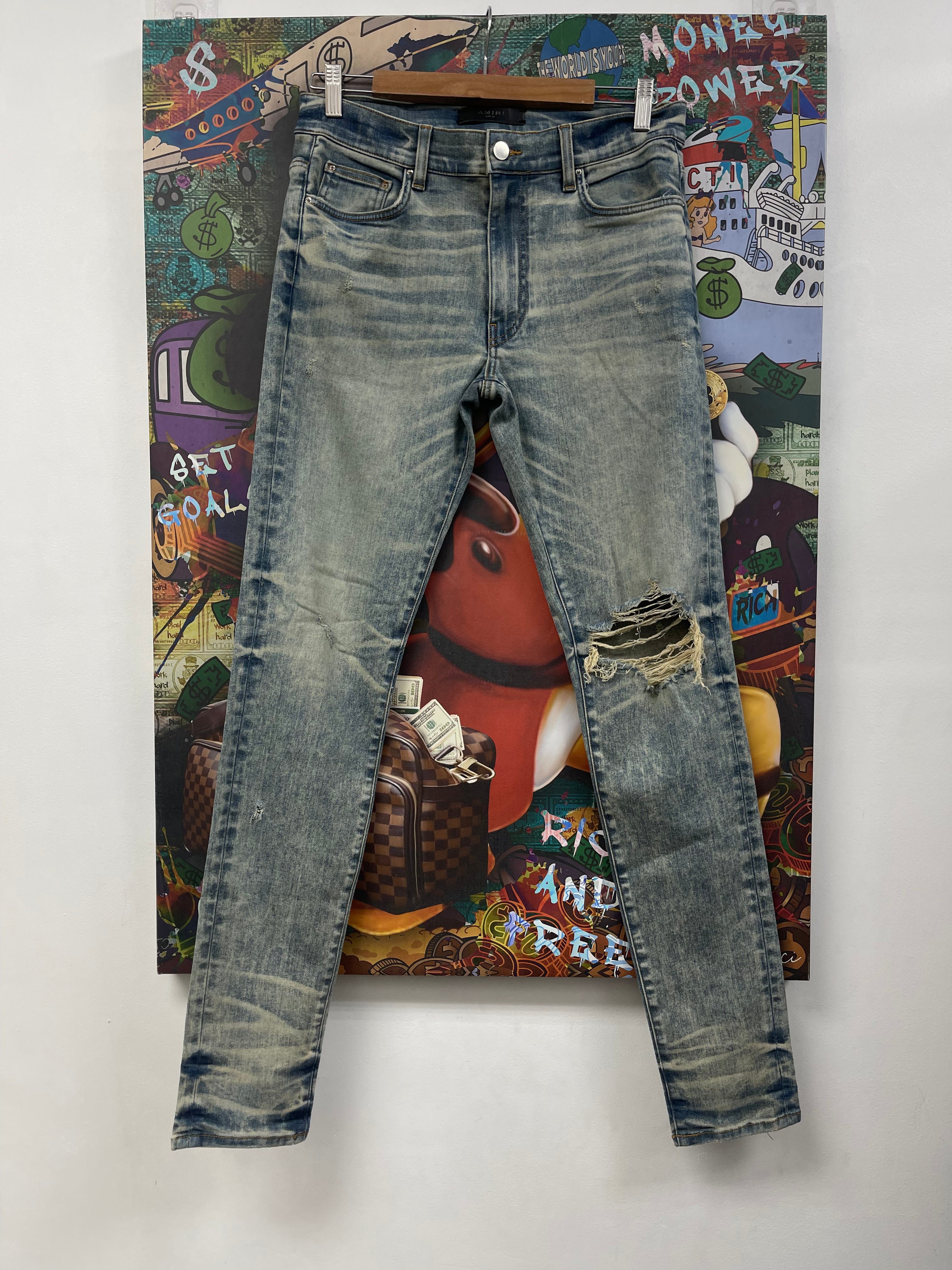 Amiri Dirty Indigo Knee Rip Jeans