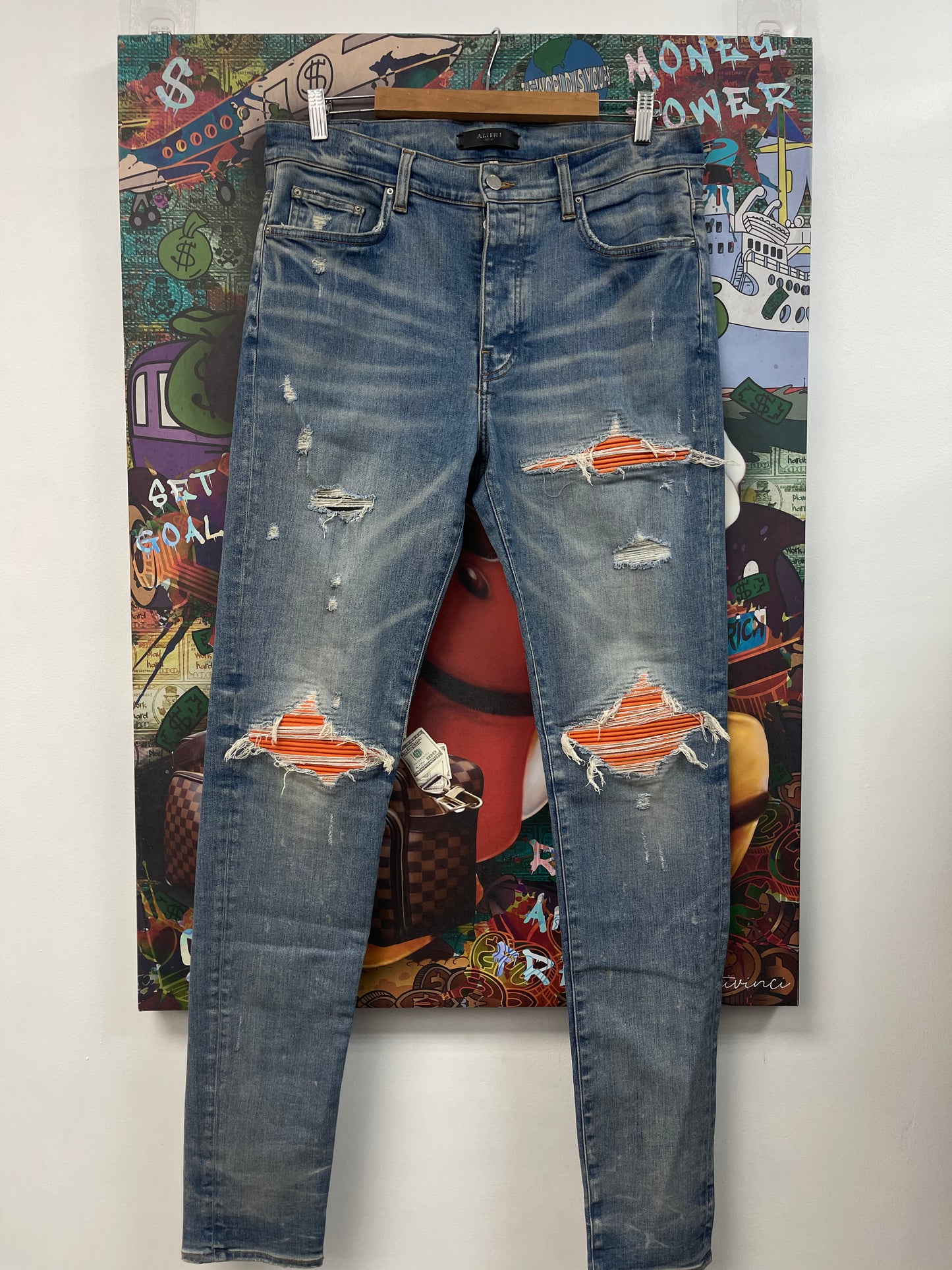 Amiri MX1 Light Wash Orange Patch Jeans