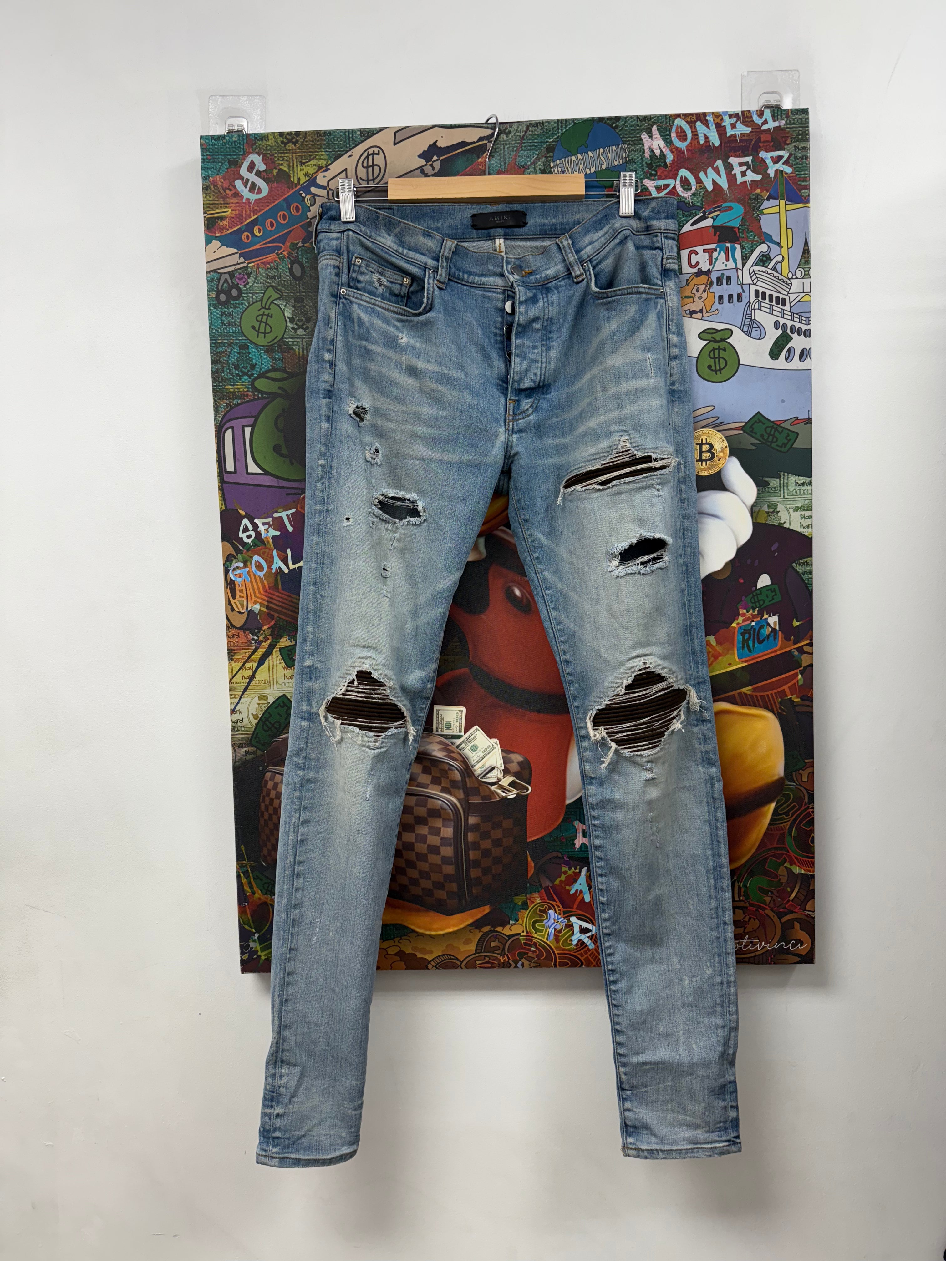 Amiri MX1 Light Wash Brown Suede Patch Jeans