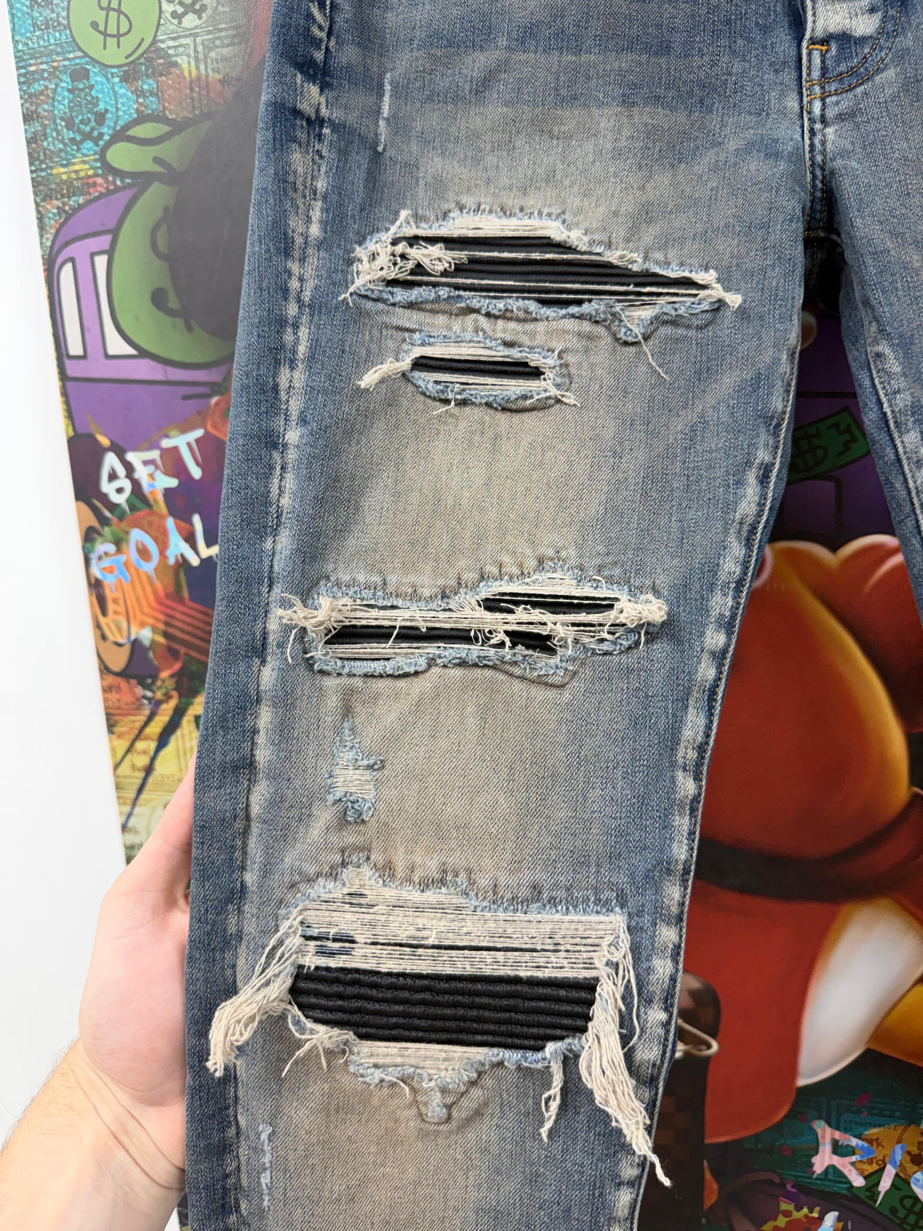Amiri MX1 Rust Black Thrasher Patch Jeans