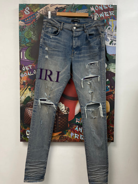 Amiri Light Wash Purple Serif Logo Jeans