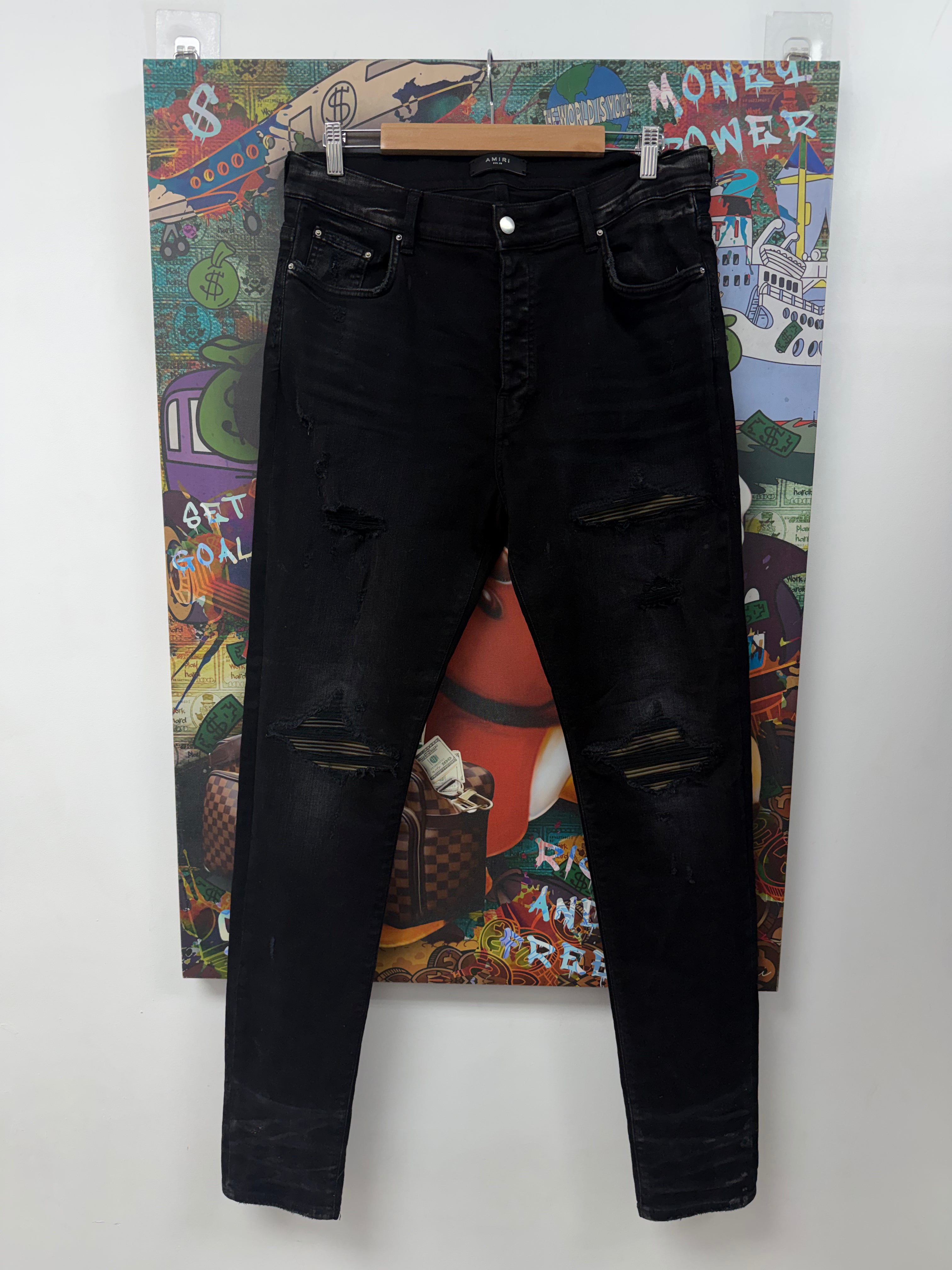 Amiri MX1 Black Wash Camo Leather Patch Jeans