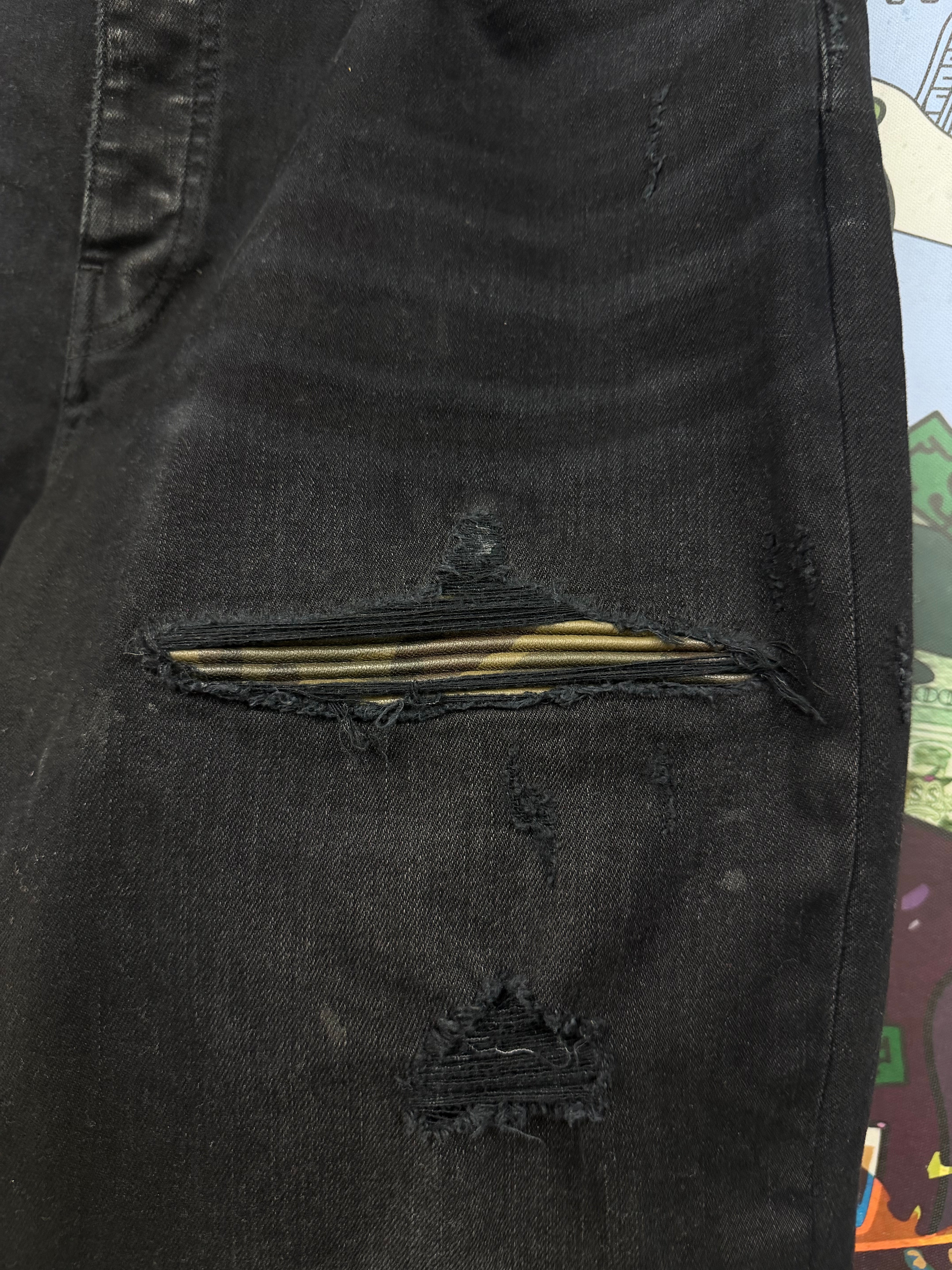 Amiri MX1 Black Wash Camo Leather Patch Jeans