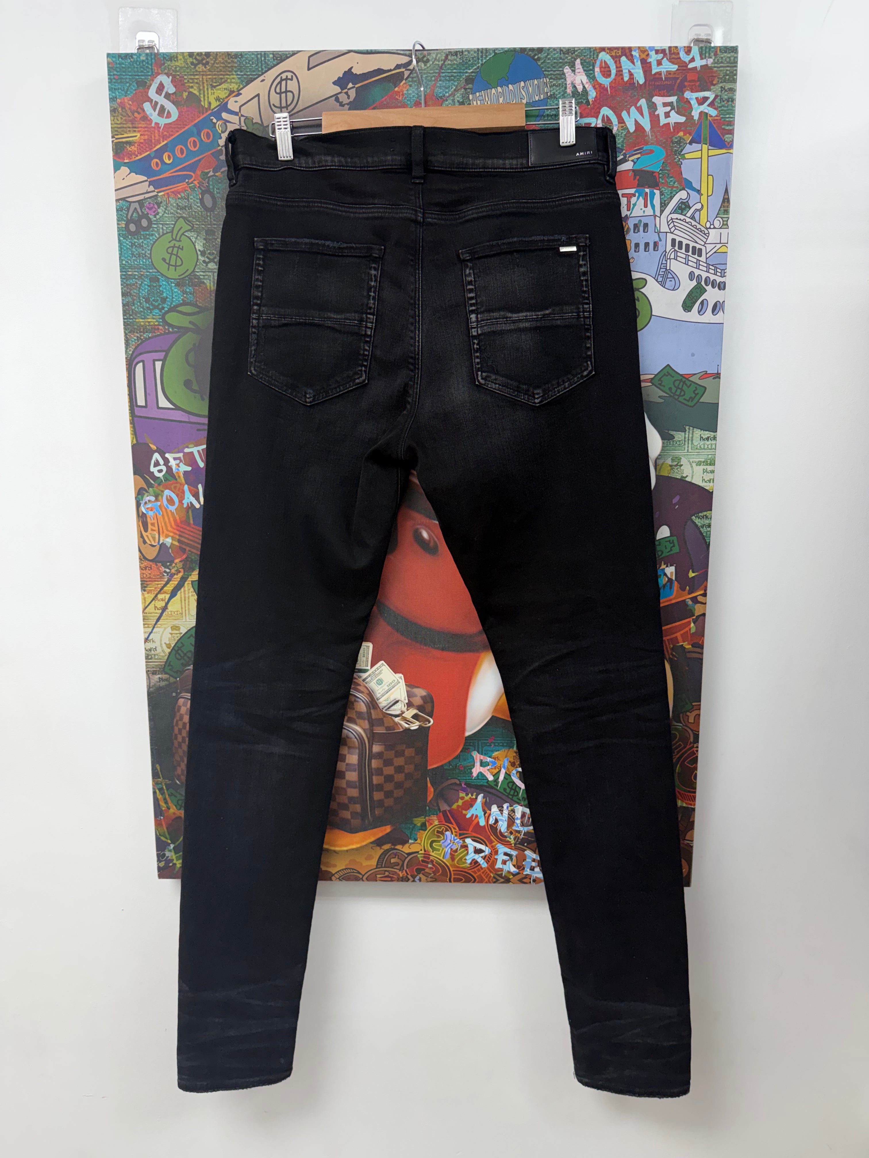 Amiri MX1 Black Wash Camo Leather Patch Jeans