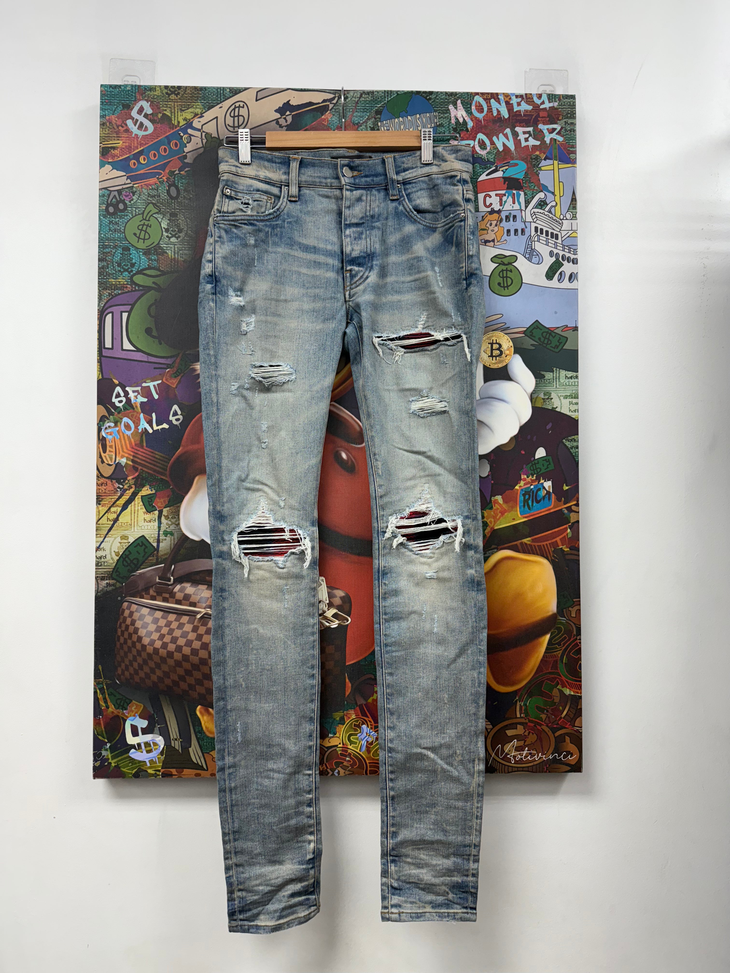 Amiri MX1 Light Wash Navy Red Patch Jeans