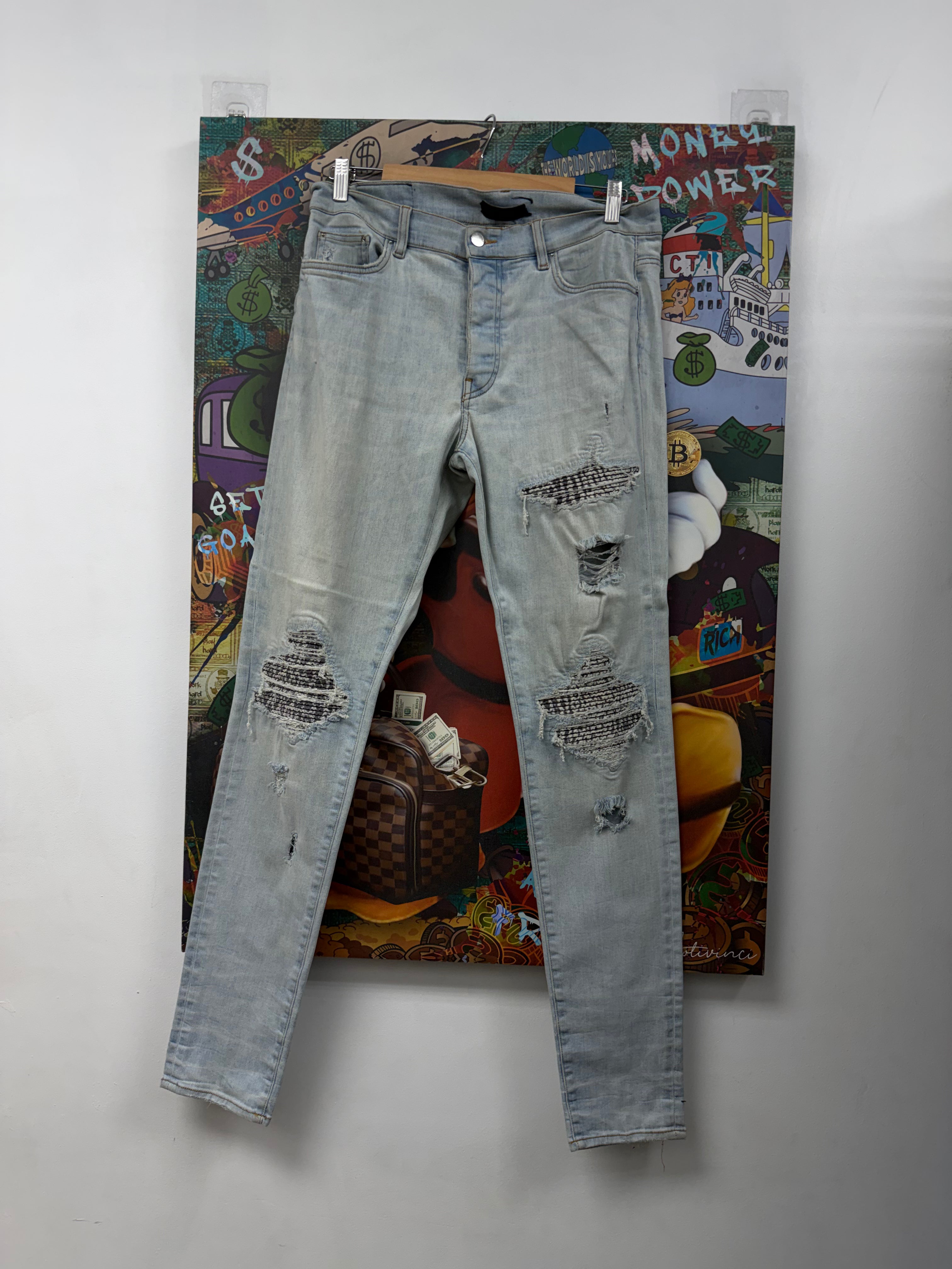 Amiri MX1 Light Wash Zebra Patch Jeans