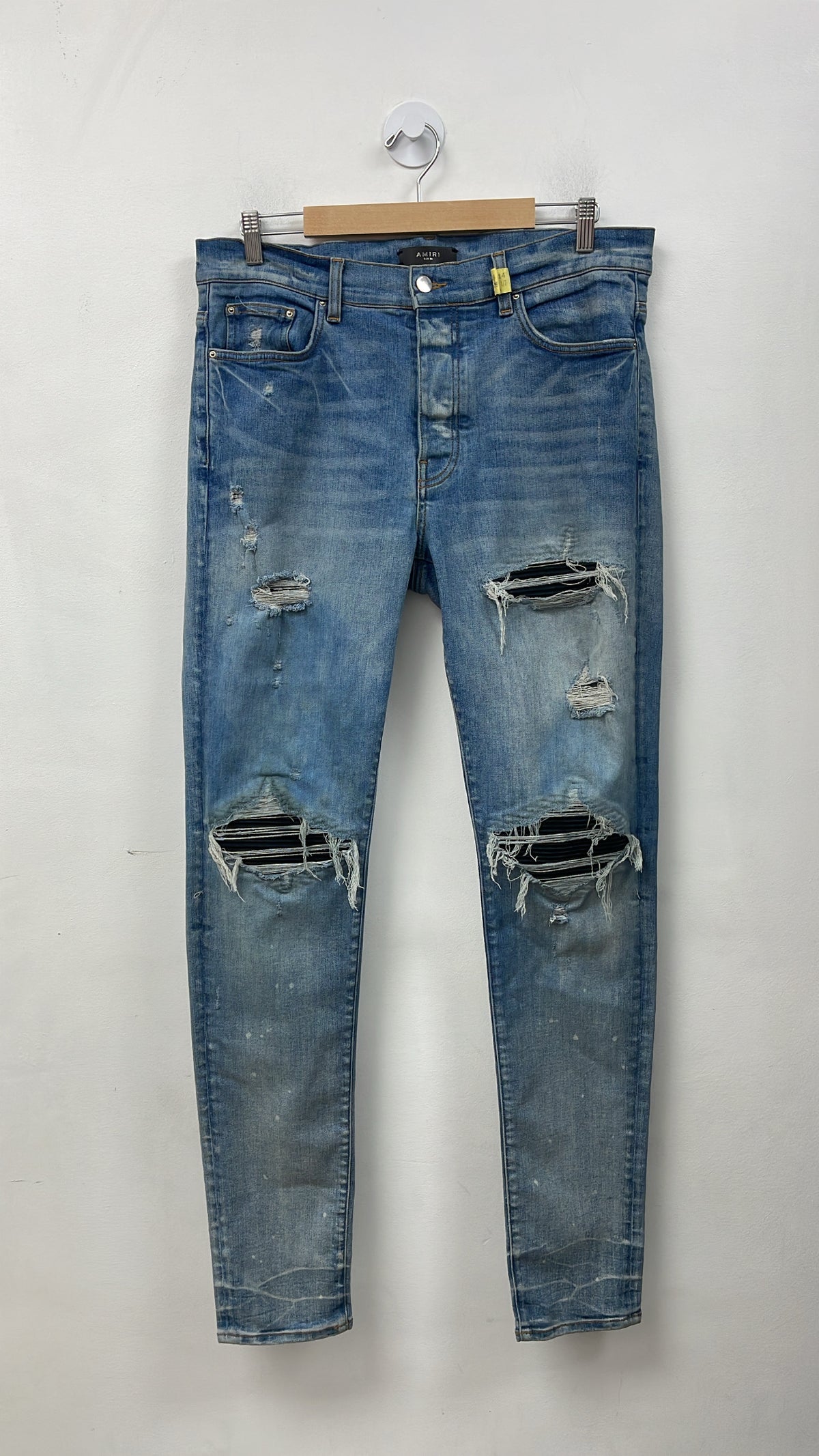 Amiri MX1 Light Wash Black Suede Patch Jeans