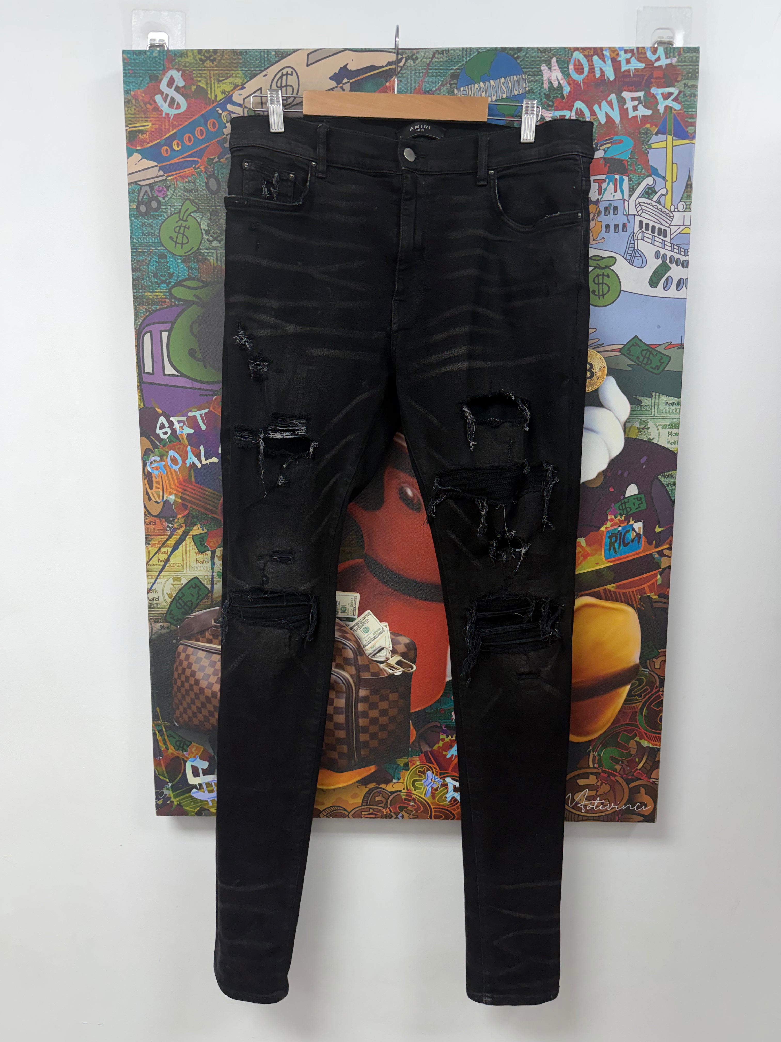 Amiri MX1 Black Wash Wool Distressed Patch Jeans