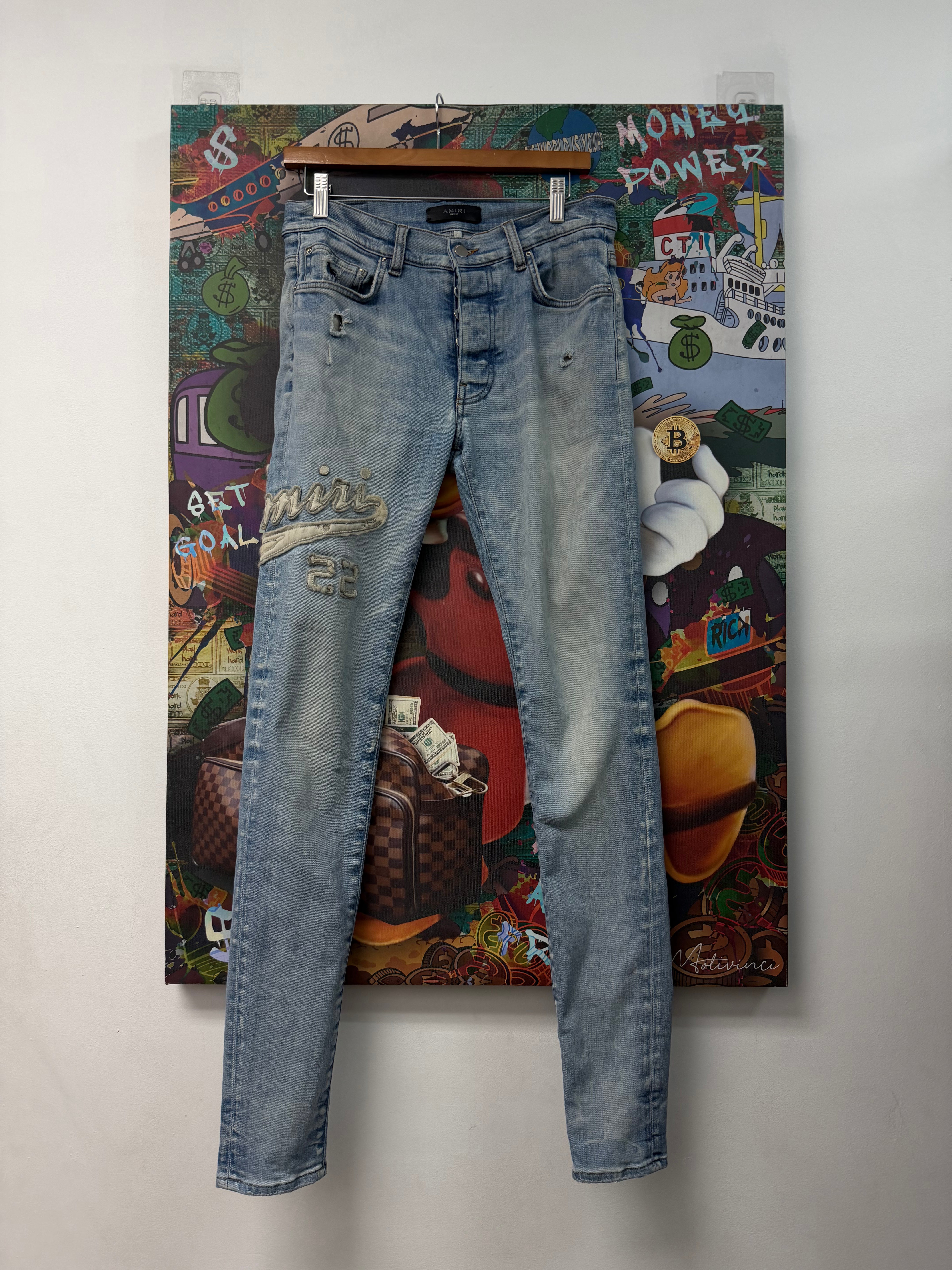 Amiri Light Wash Varsity Side Logo Jeans