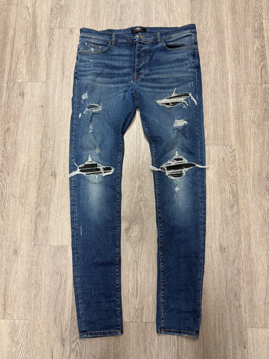 Amiri MX1 Light Wash Black Patch Jeans