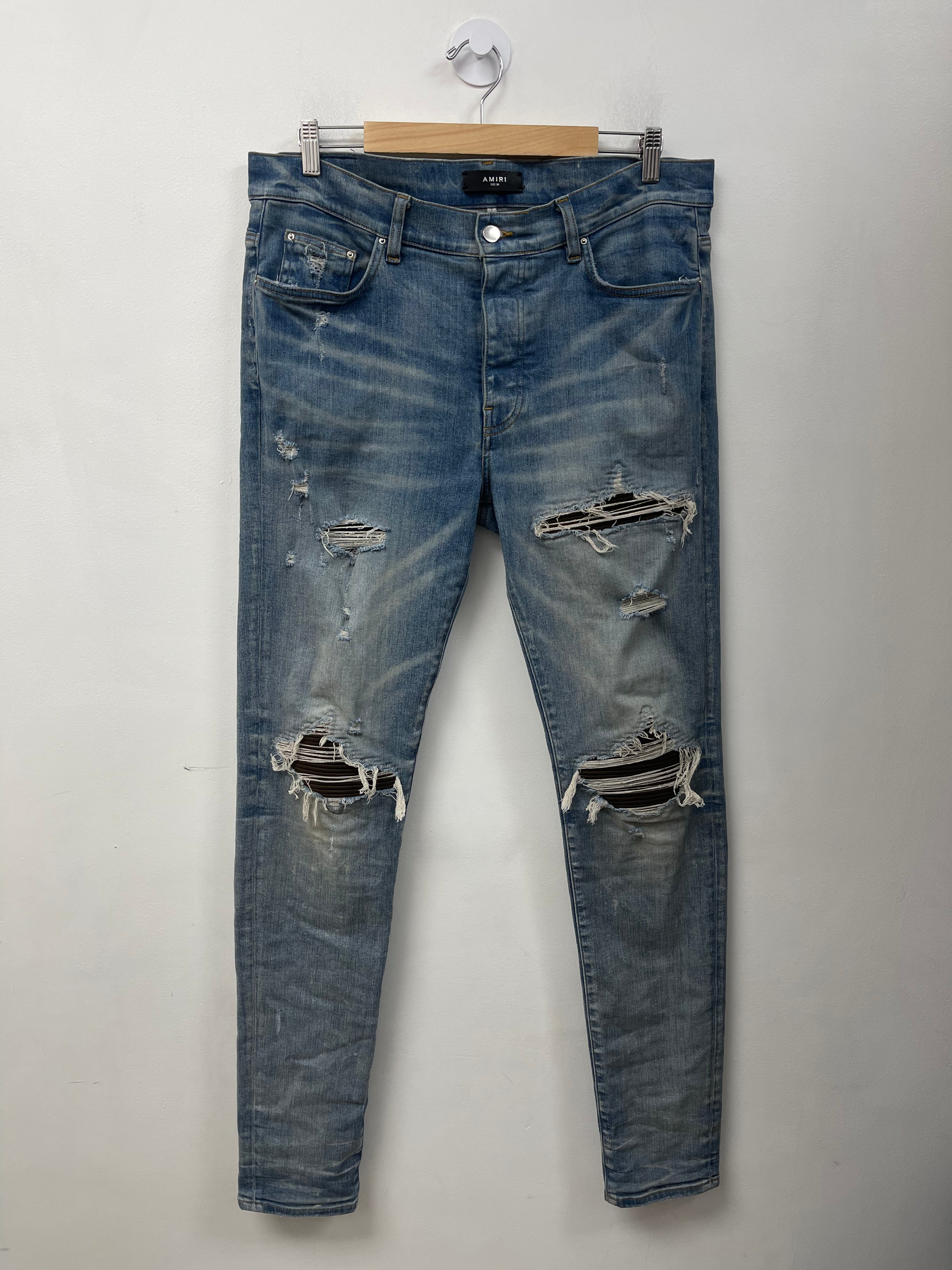 Amiri MX1 Light Wash Brown Patch Jeans