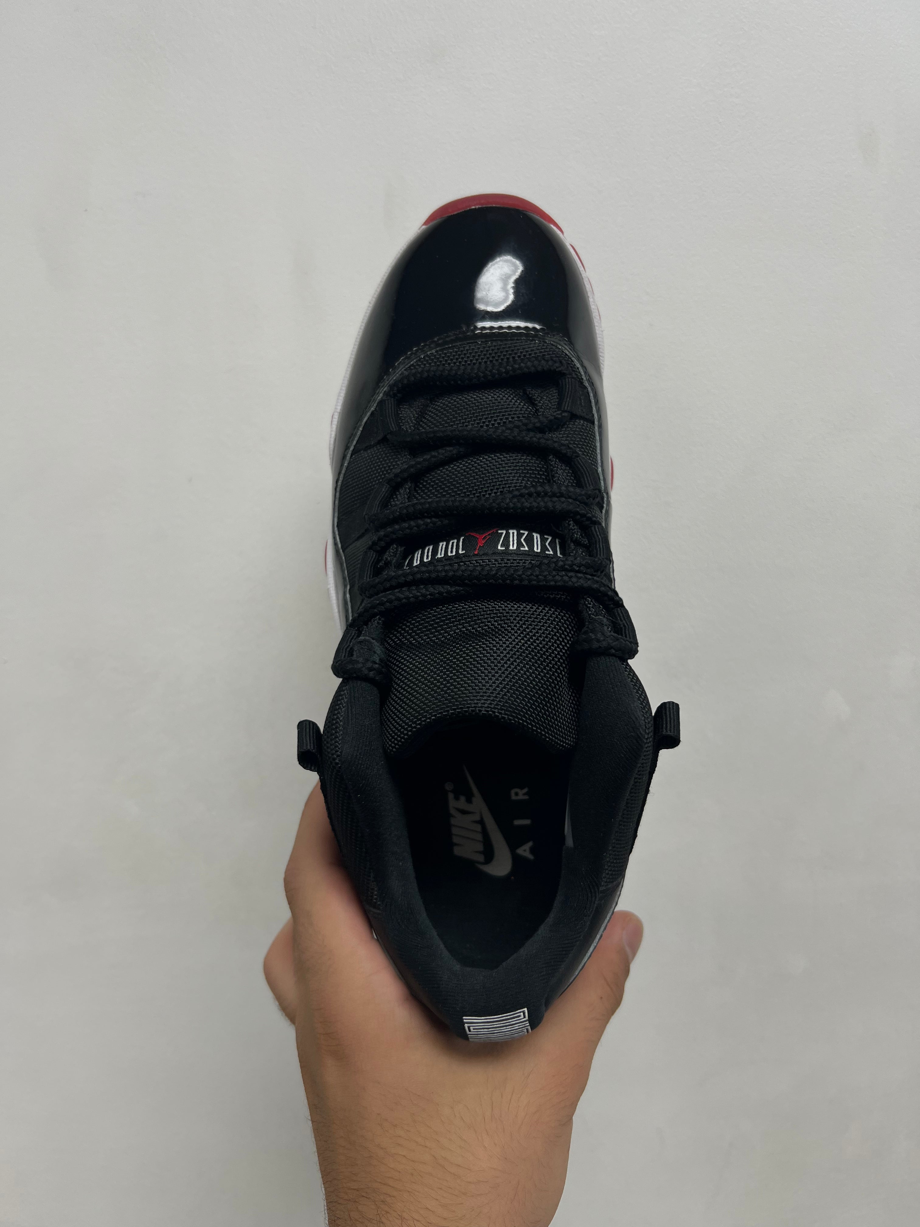 Jordan 11 Low Bred Sneakers