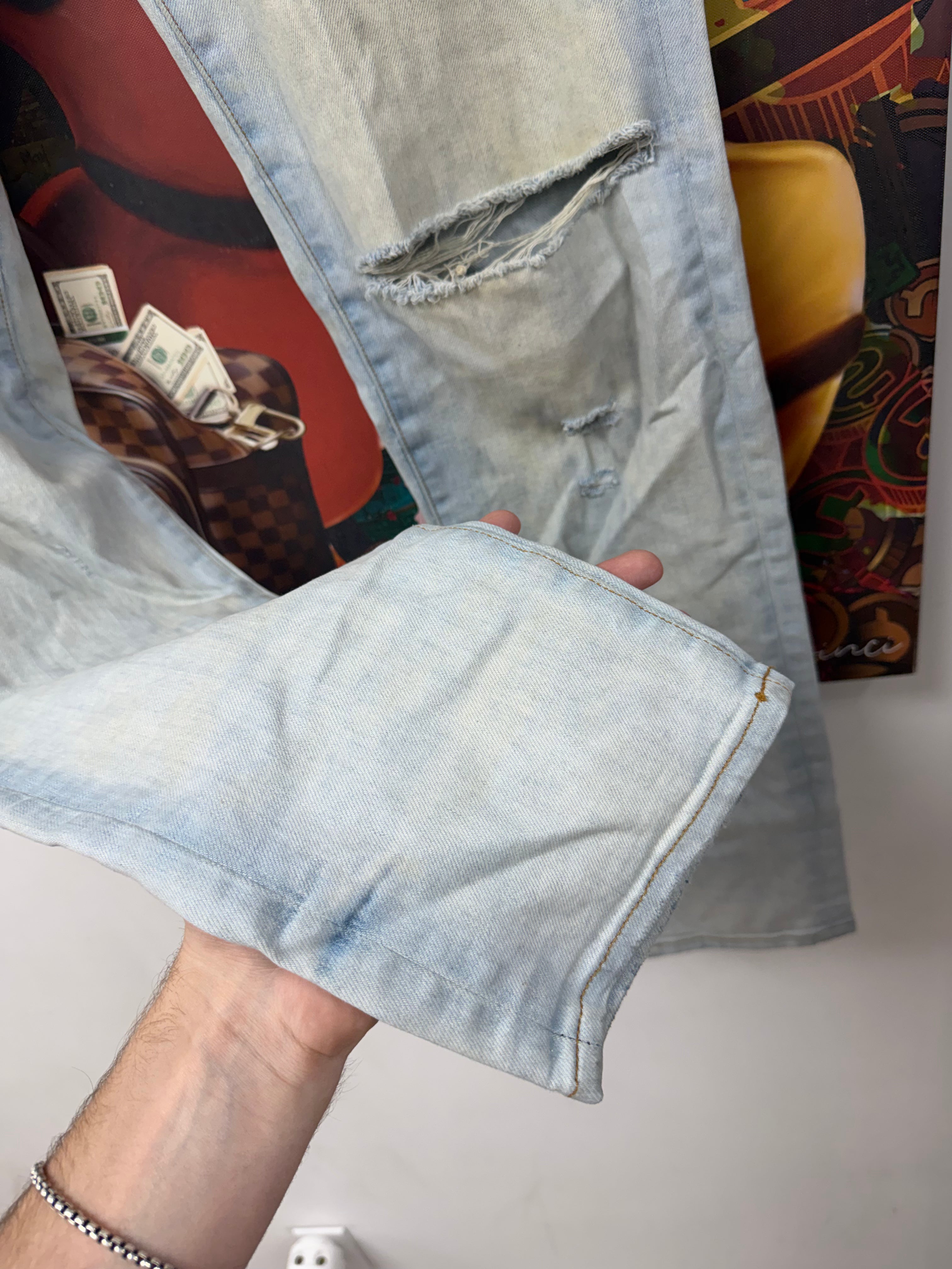 Amiri Light Wash Thrasher Jeans