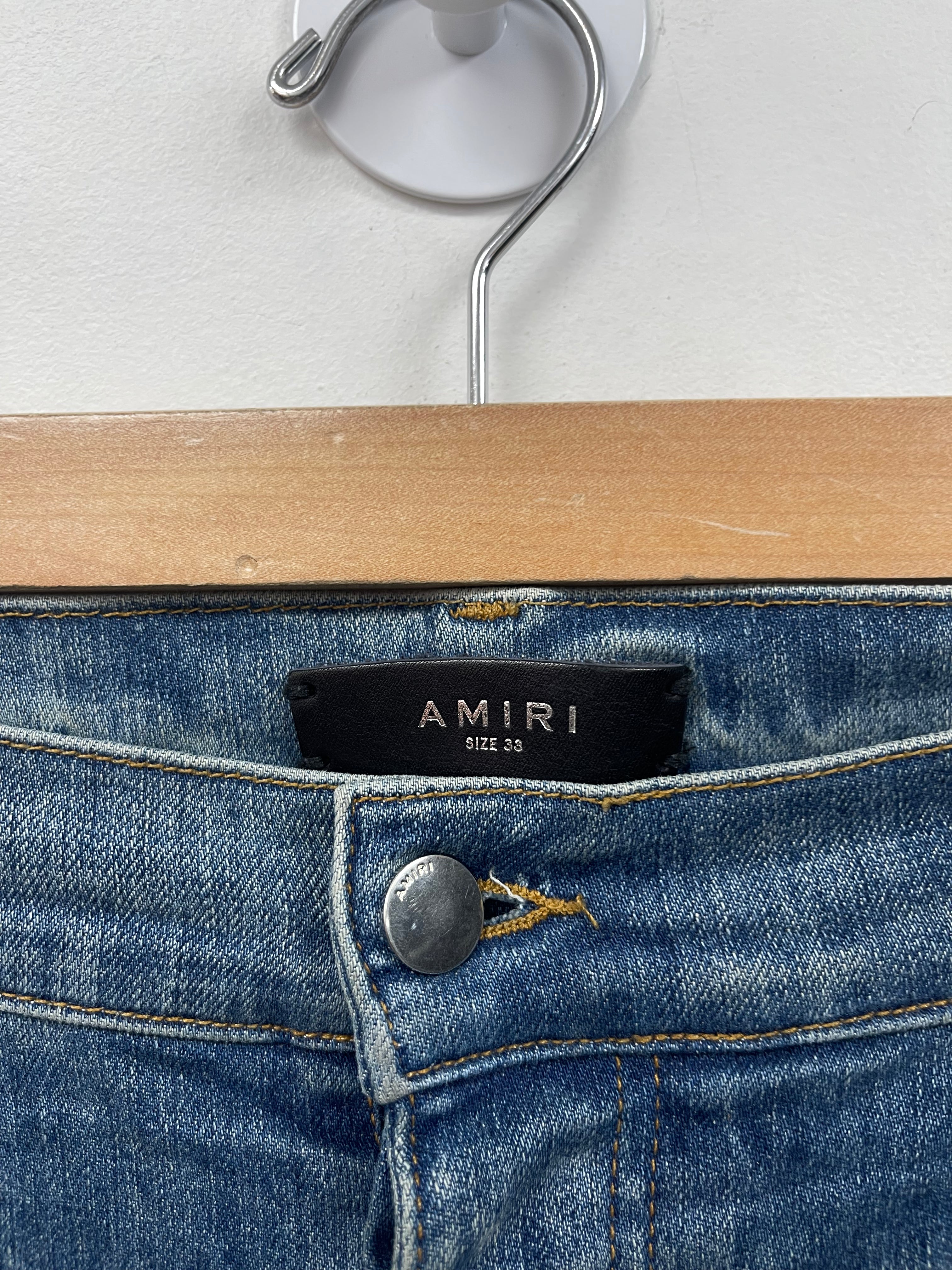 Amiri Light Wash White Stripe Jeans