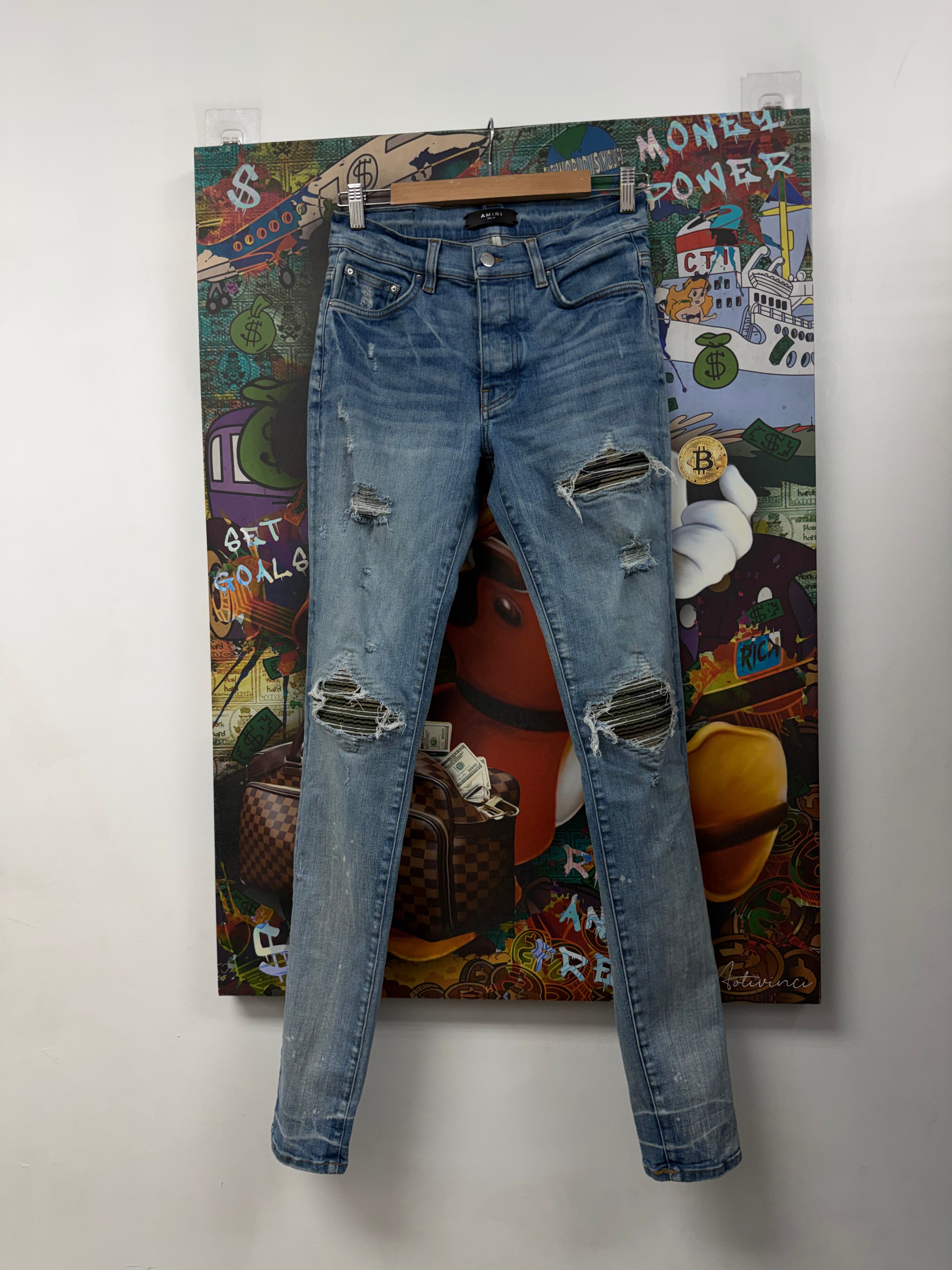 Amiri MX1 Light Wash Camo Patch Jeans