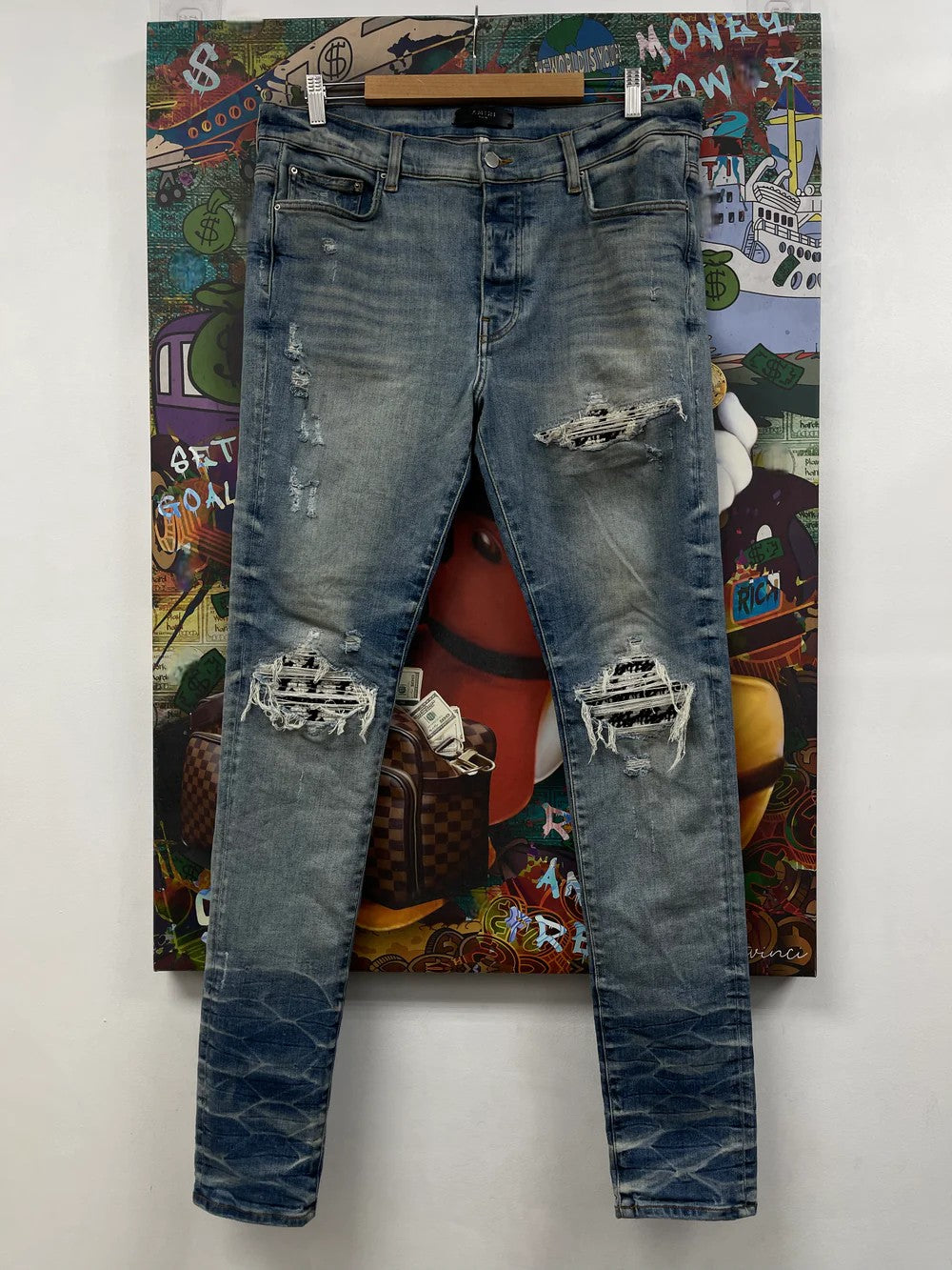 Amiri MX1 Boucle Patch Light Wash Jeans