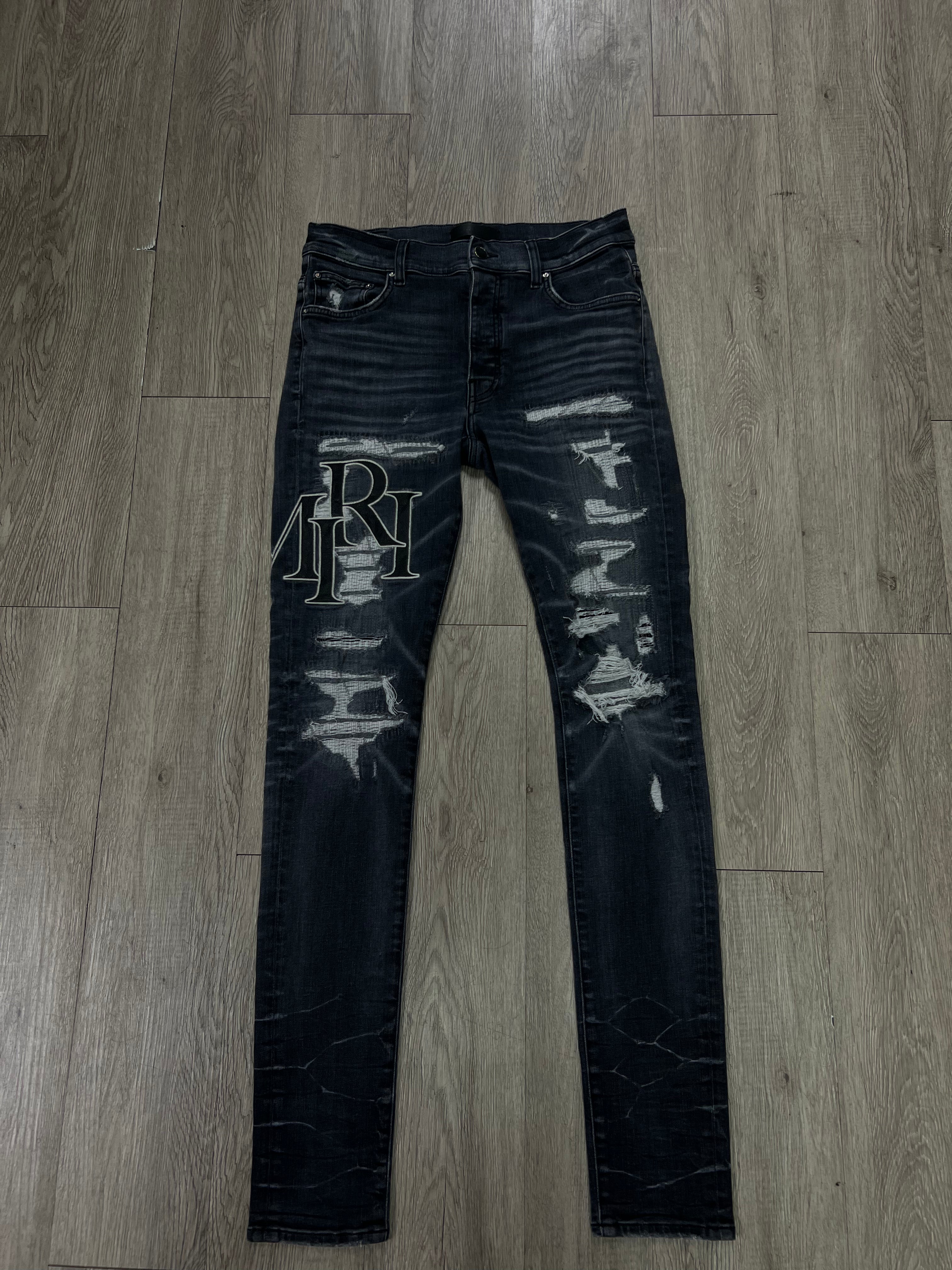 Amiri Grey Distressed Staggered Side Logo Jeans