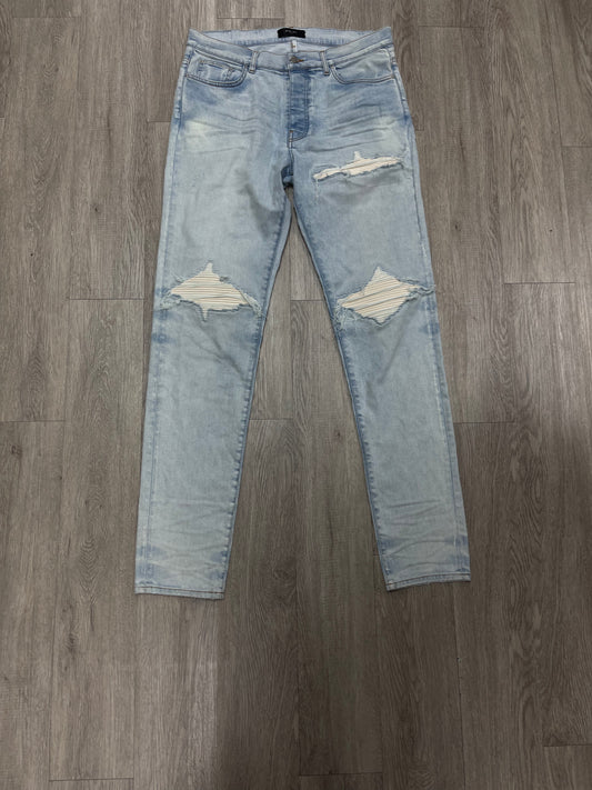 Amiri MX1 Light Wash White Patch Jeans