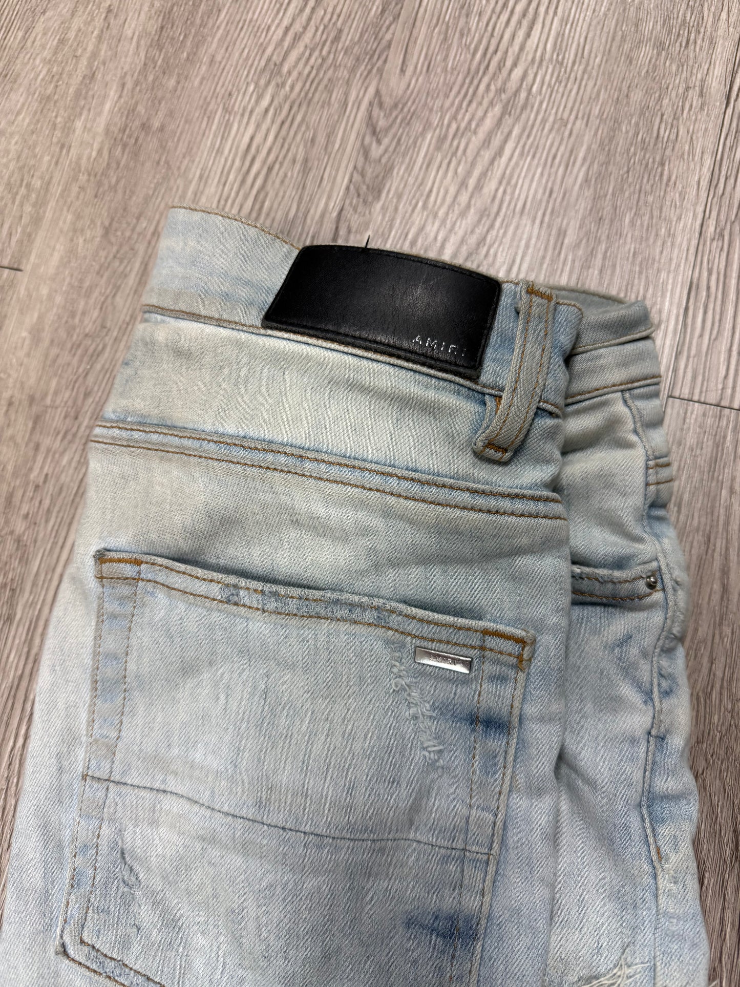 Amiri Lightwash Thrasher Tie Dye Jeans