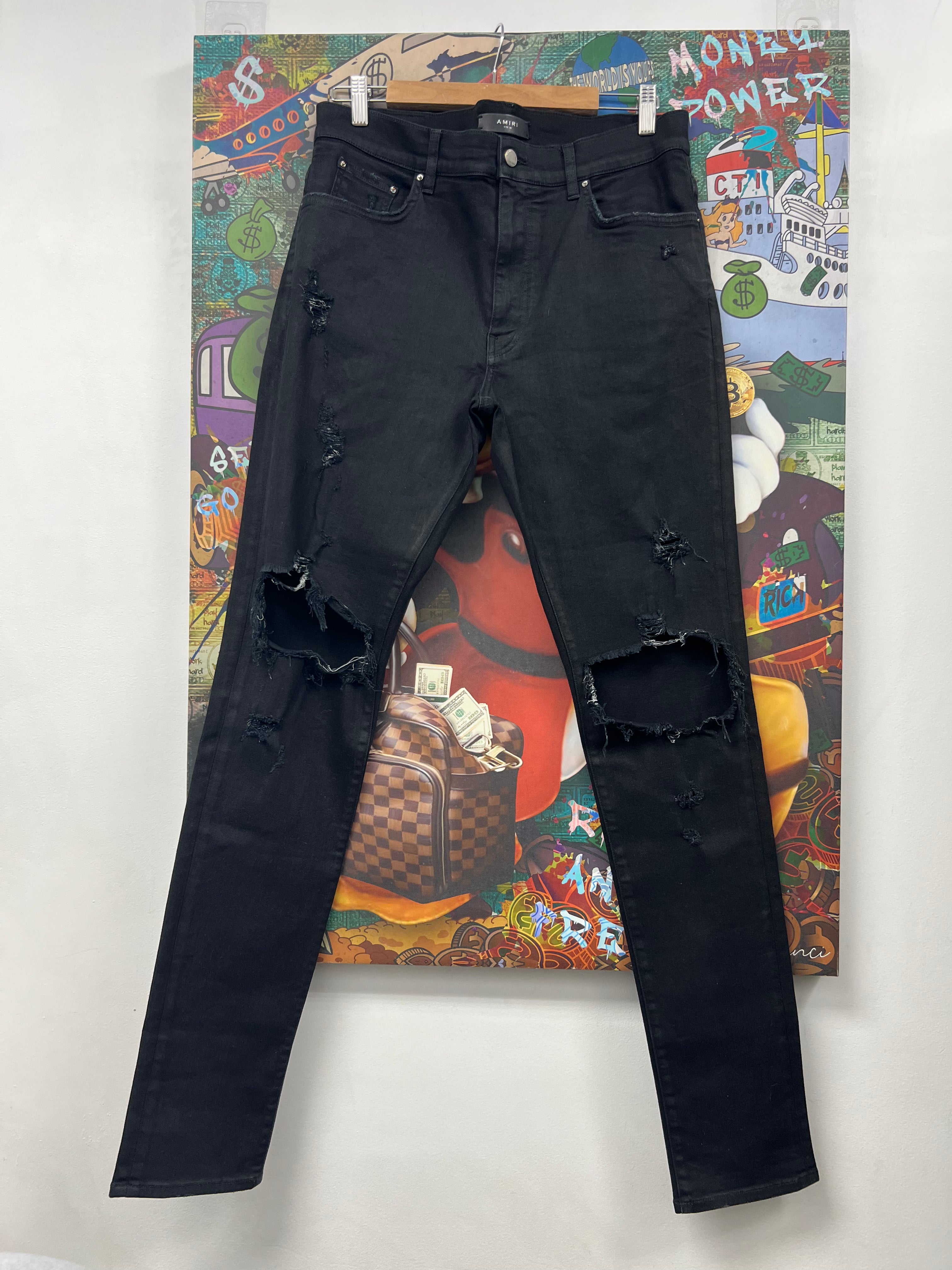 Amiri Black Ripped Thrasher Jeans