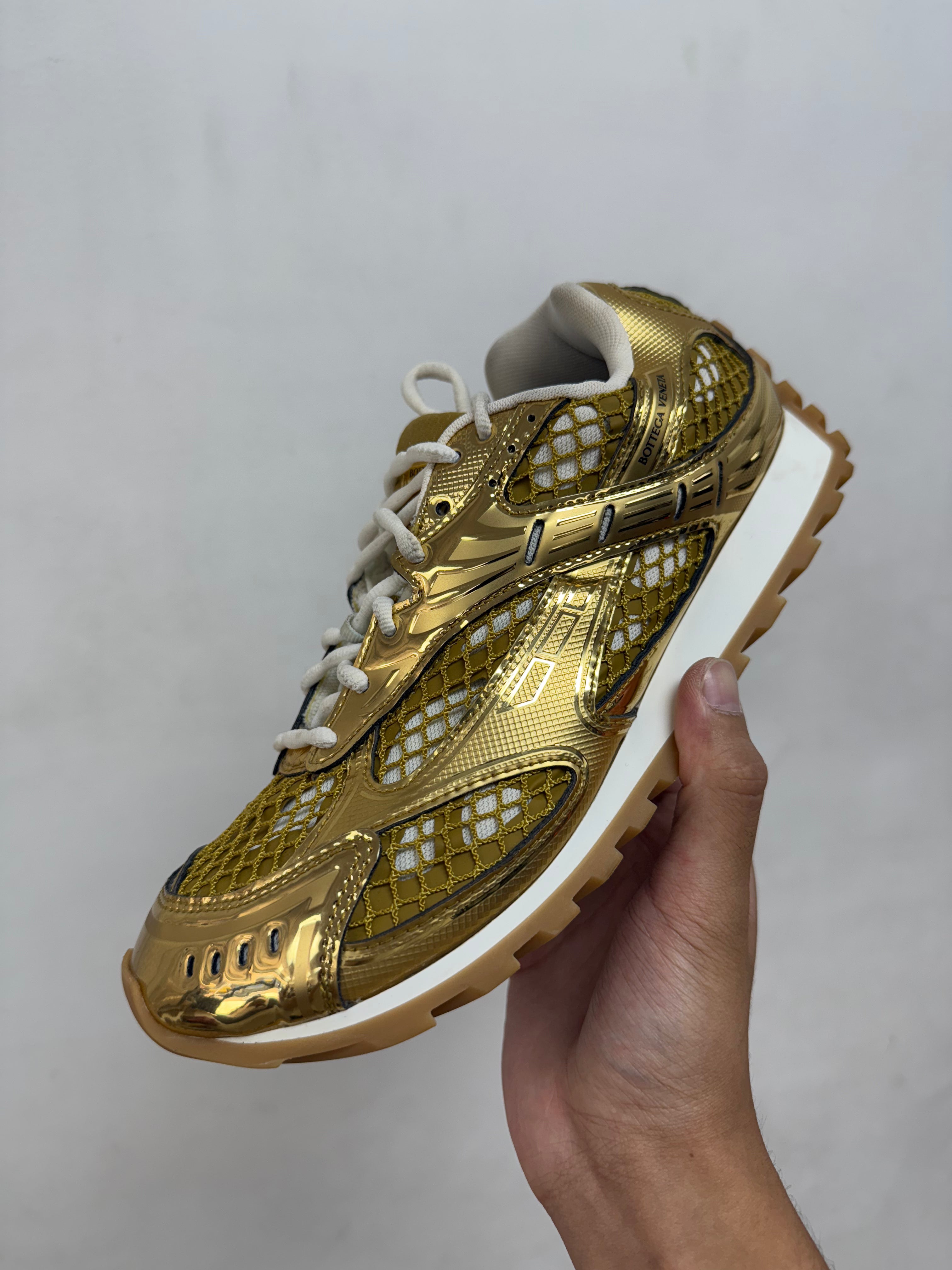 Bottega Veneta Gold Orbits Sneakers
