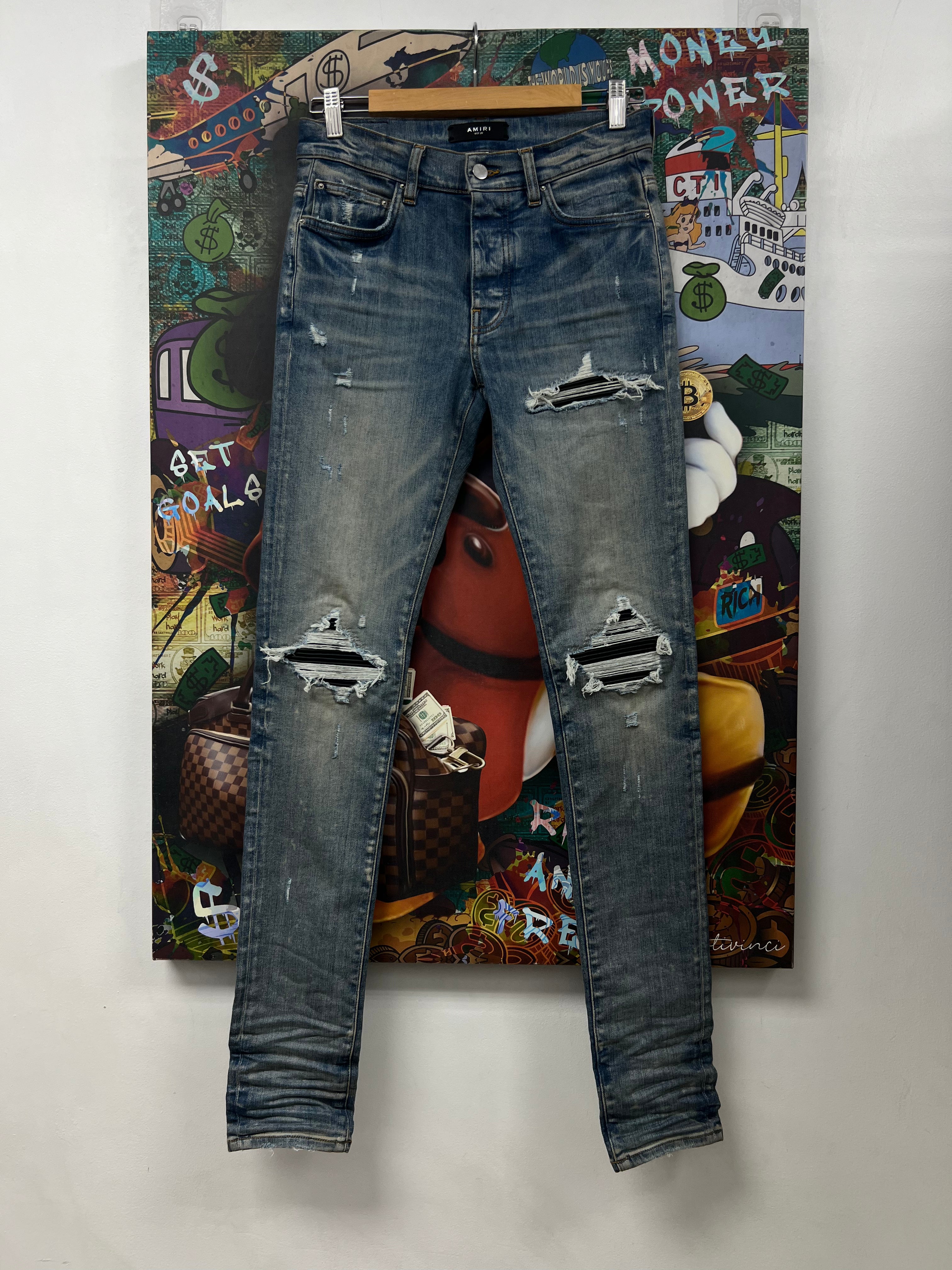 Amiri MX1 Light Indigo Black Patch Jeans