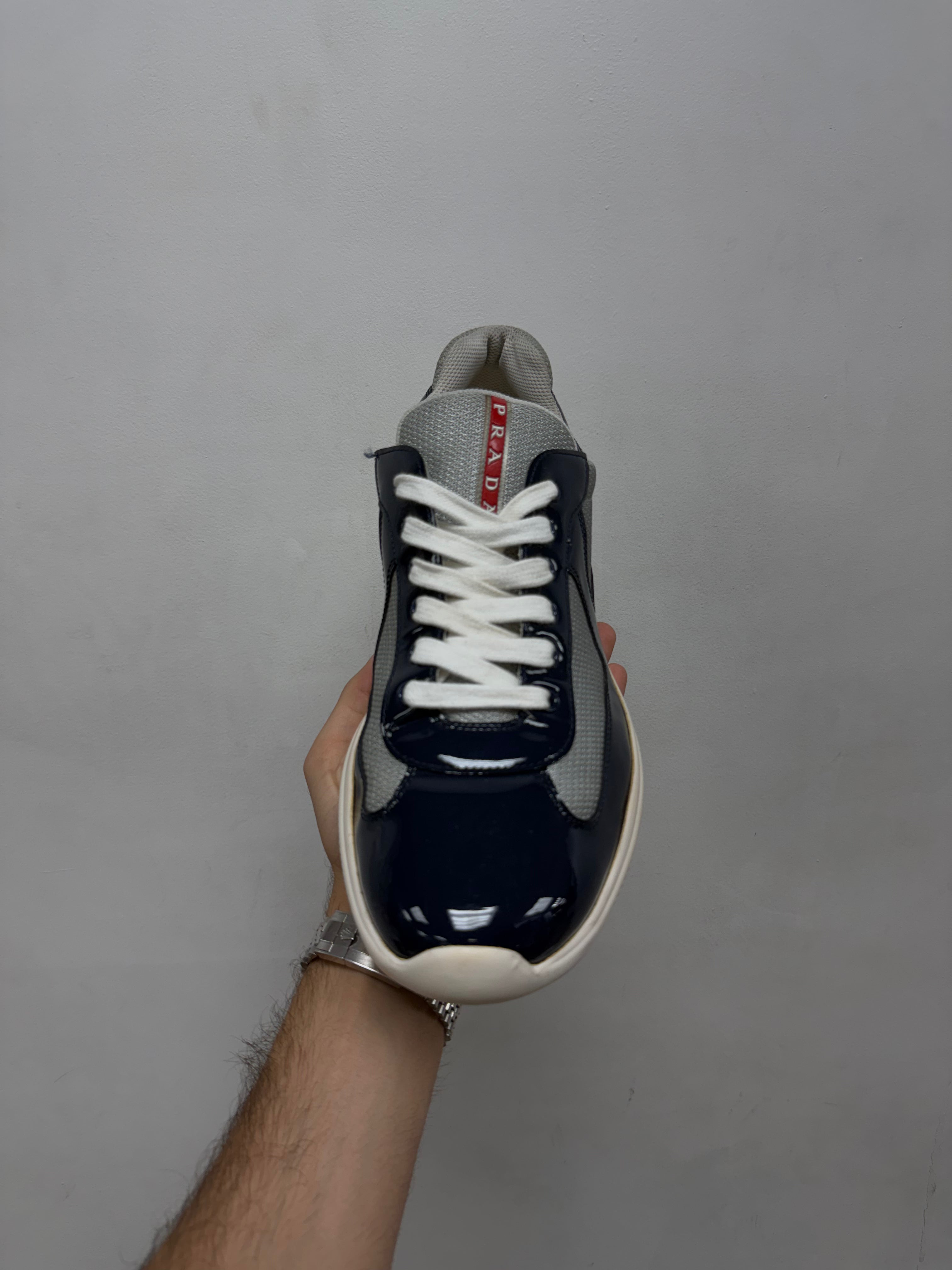 Prada Navy White Patent Cup Sneakers