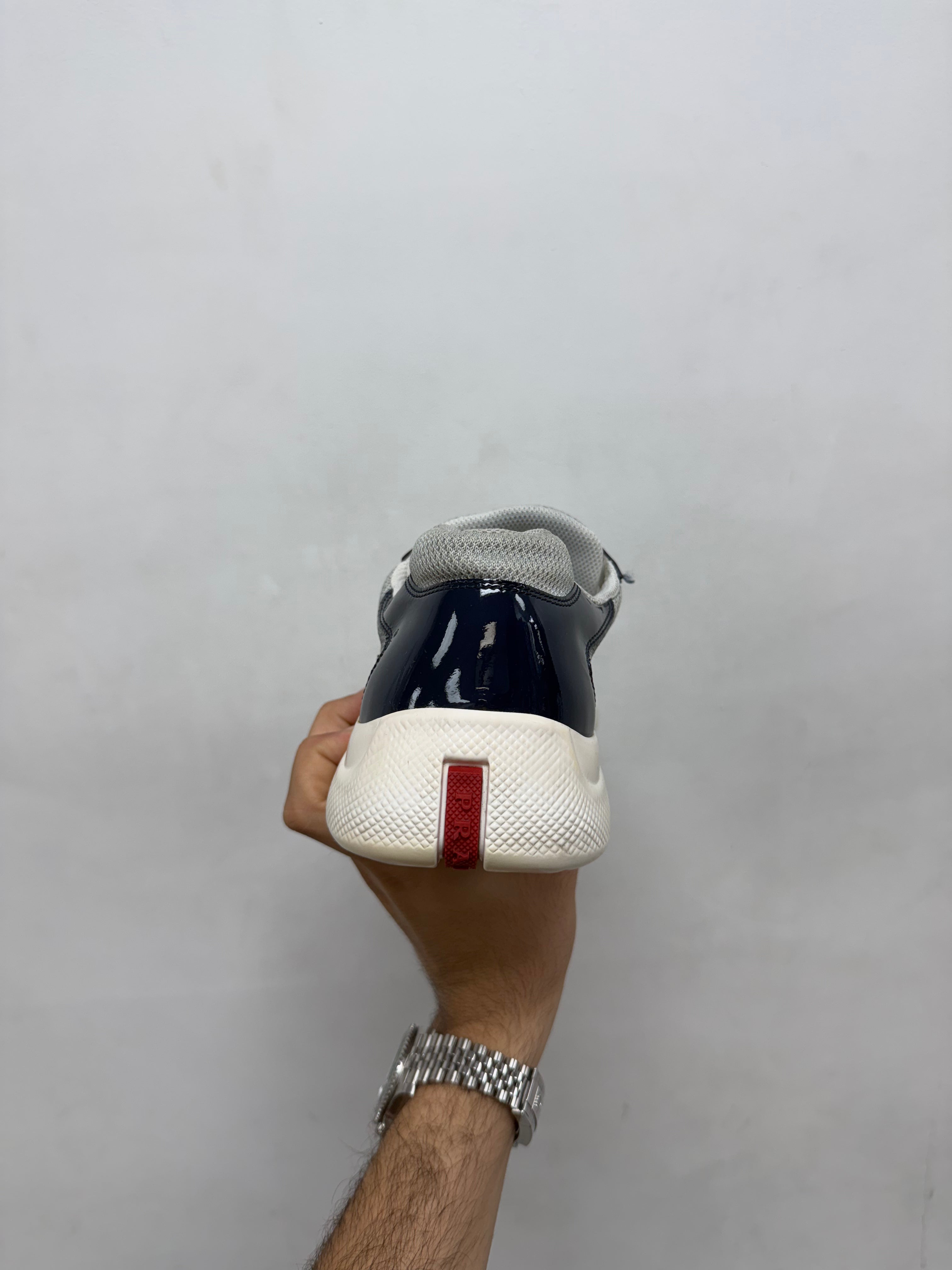 Prada Navy White Patent Cup Sneakers