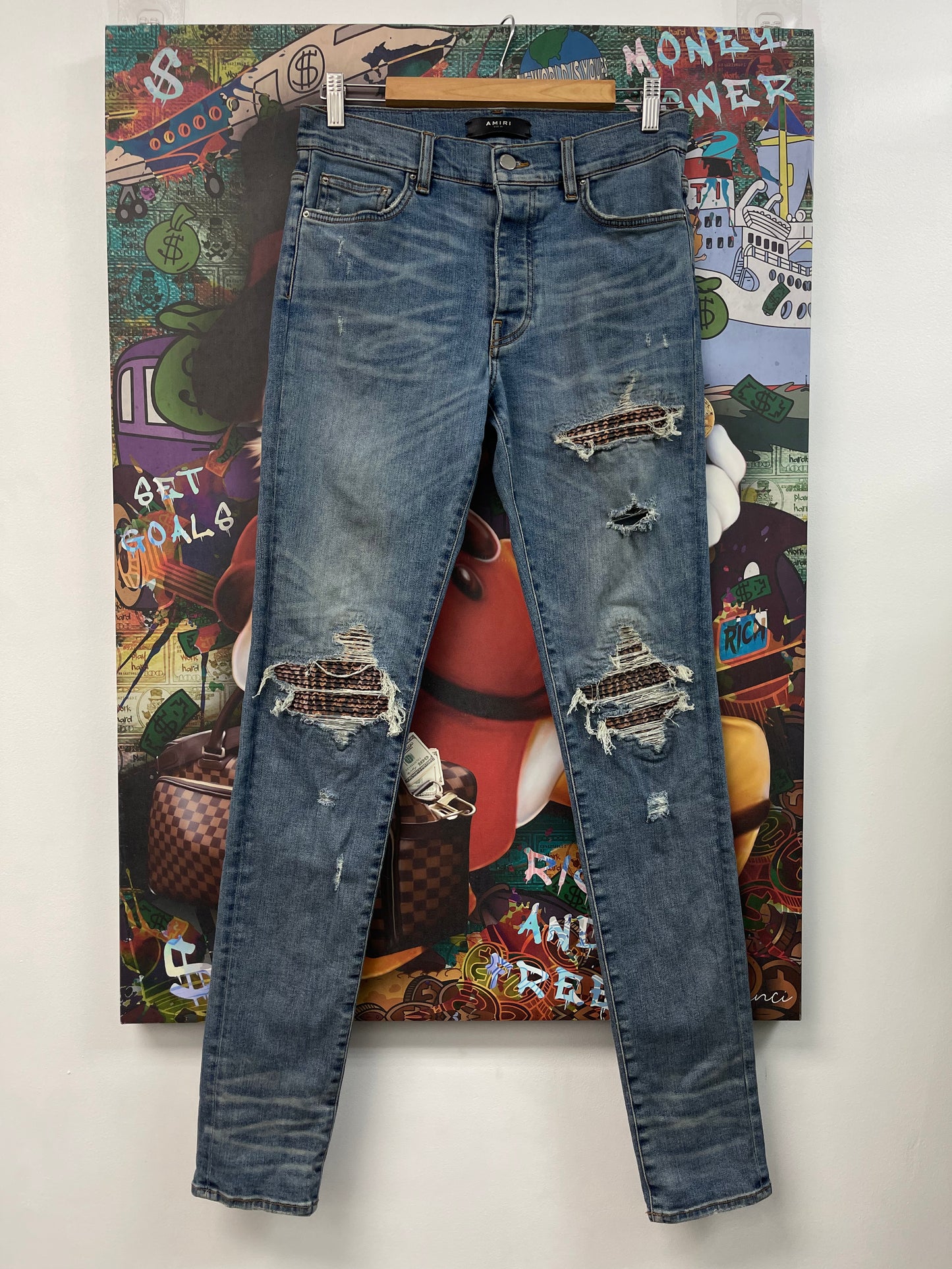 Amiri Mx1 Light Wash Cheetah Print Jeans