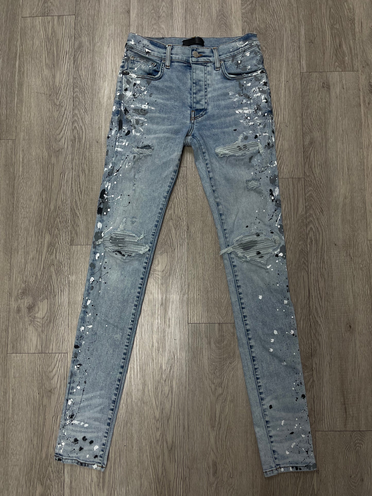 Amiri MX1 Light Wash Paint Splatter Jeans